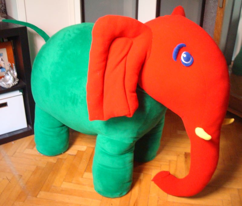 Giant red and green elephant plush from a kid’s drawing Giant elephant plush with a red head and ears and a green body, made to order from a boy's gouache drawing