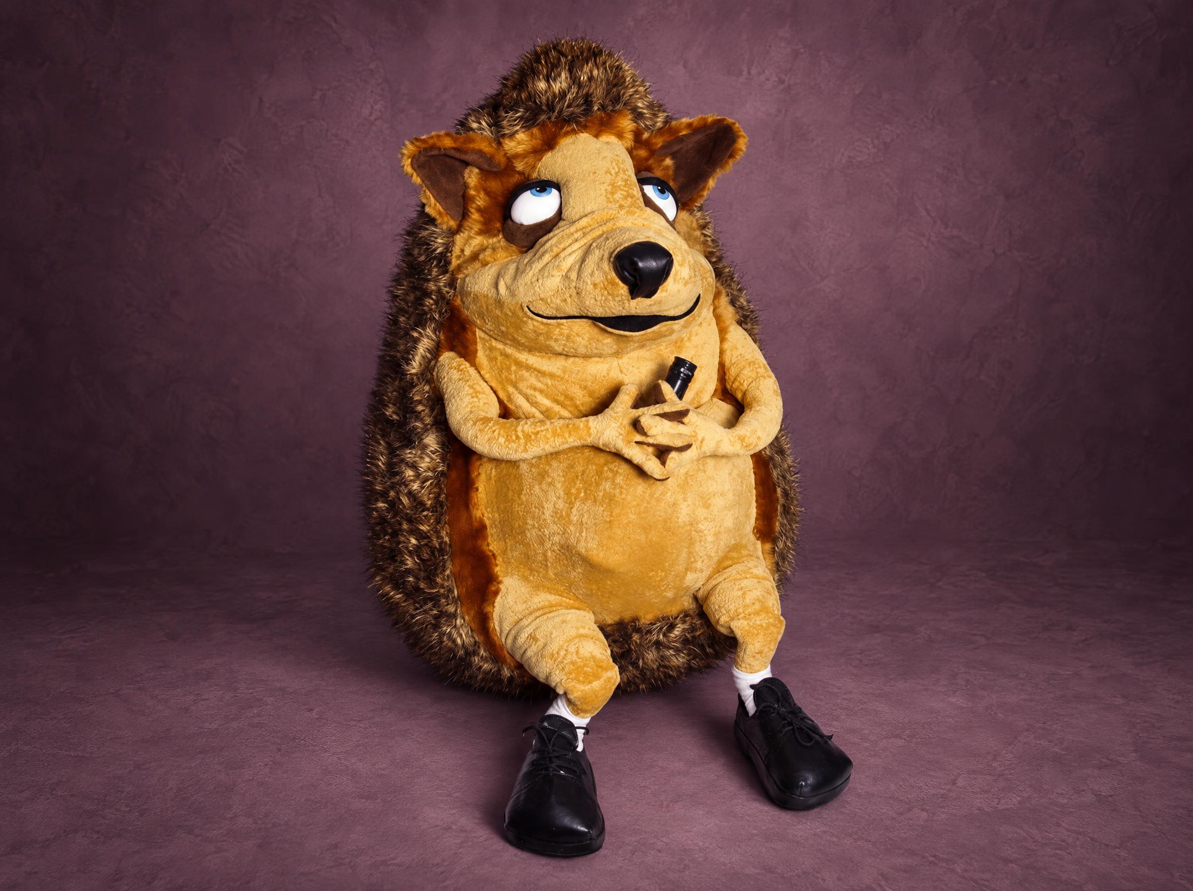 Giant hedgehog plush, 1.2 m, made to order: faux fur spines, black lace-up shoes, a bottle in his paws