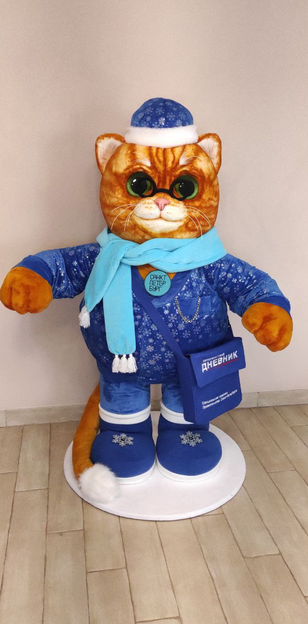 Giant plush cat mascot on its base Giant plush cat mascot standing on a round white base, ginger tail with a white tip, handmade to order