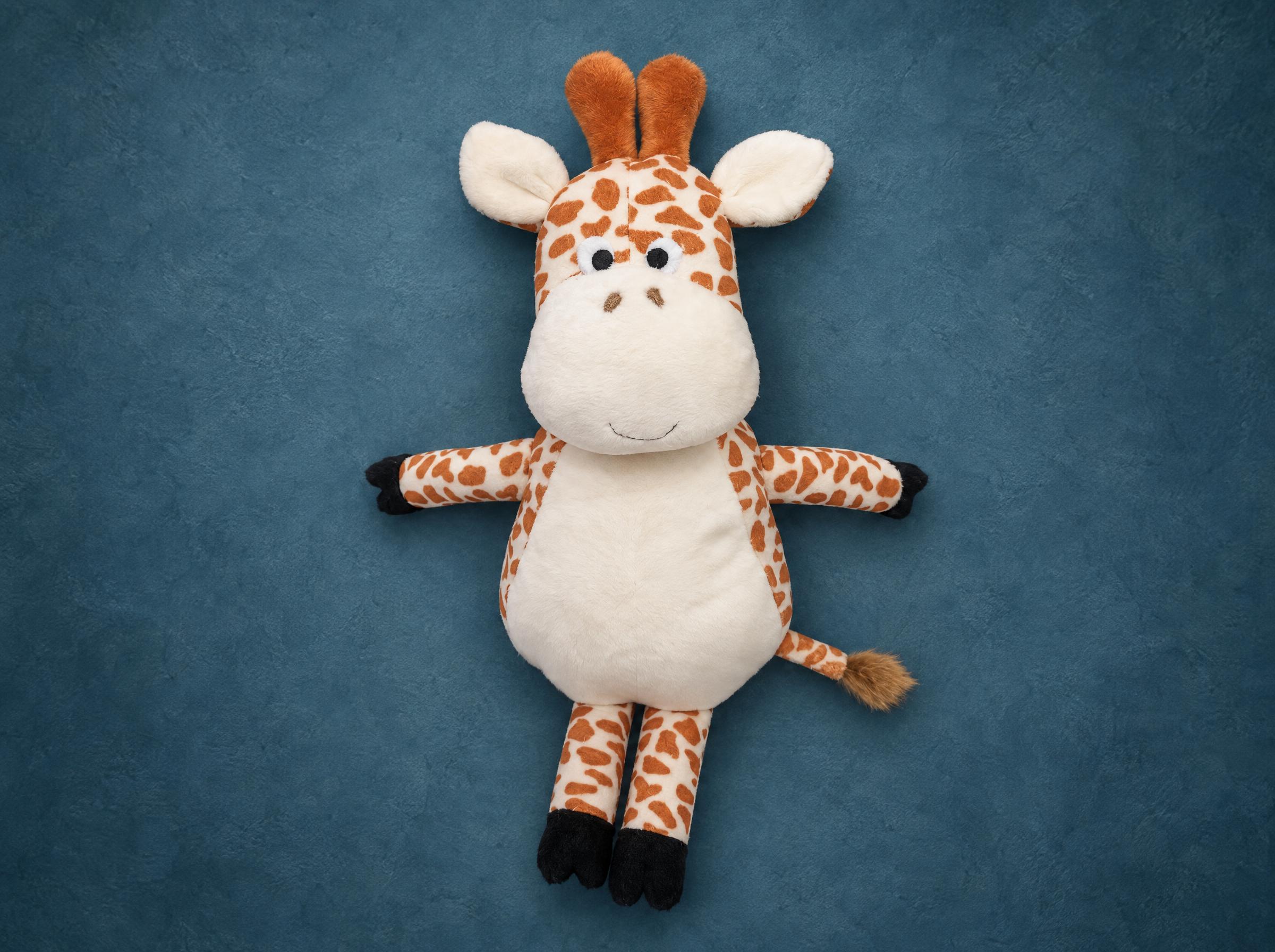 Handmade giraffe rattle toy with orange spots, orange horns and black hooves, made to order