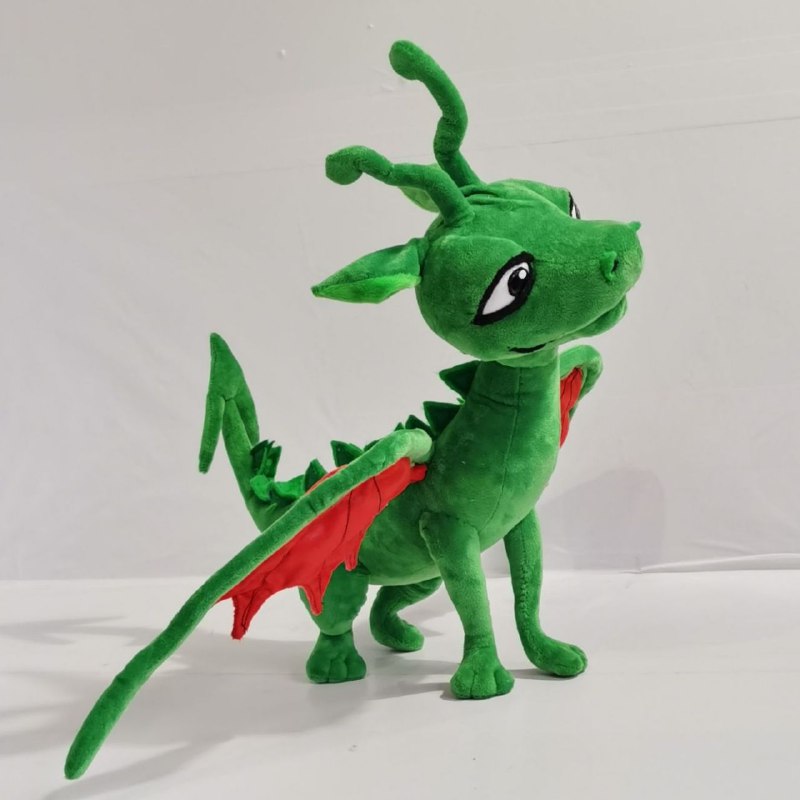 Green dragon plush with curly horns Green dragon plush with curly horns and pointed ears, inspired by How to Train Your Dragon books, made to order