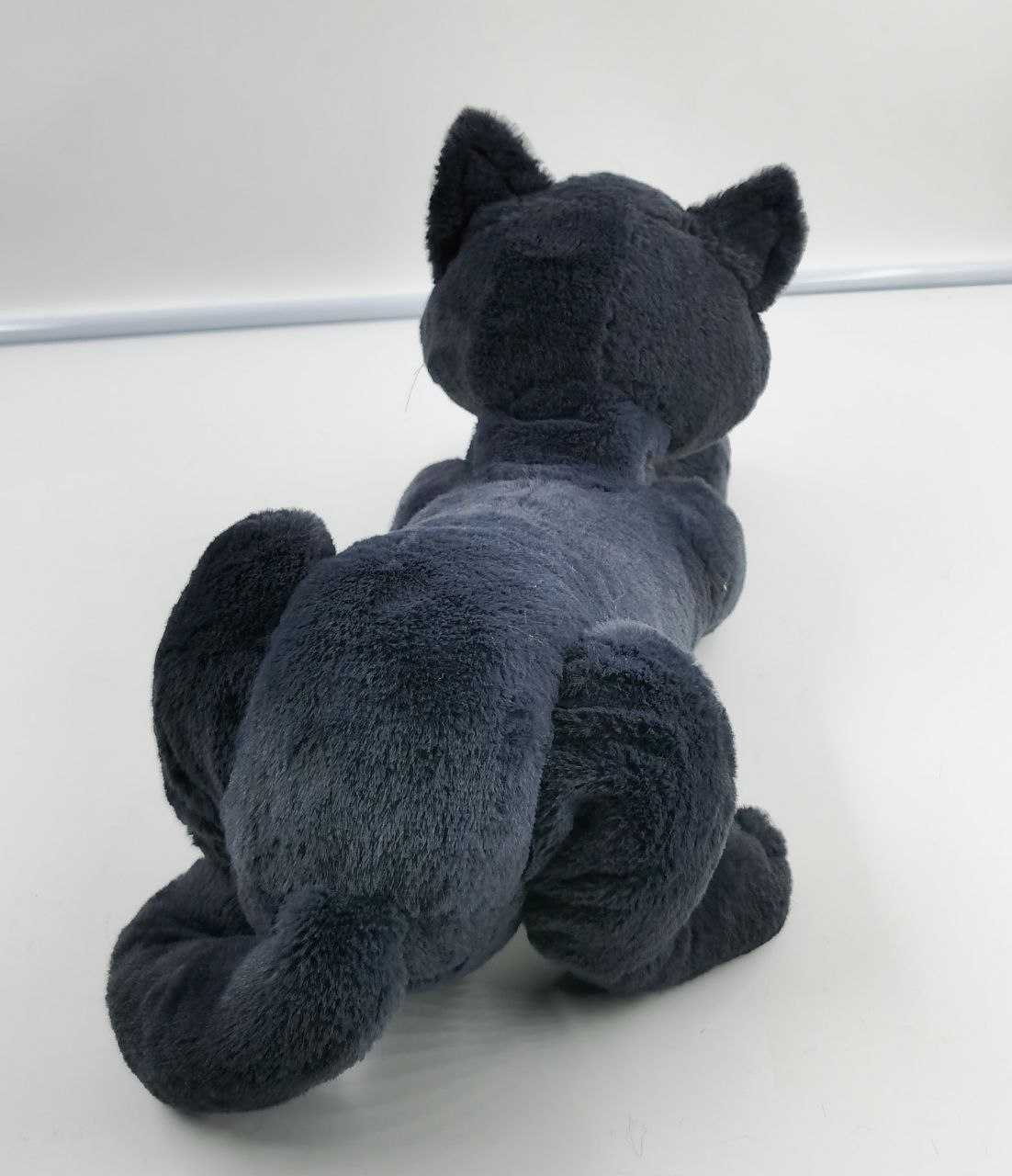 Grey cat plush from pet photos Grey cat plush from pet photos, smooth blue-grey back, pointed ears and curled tail, handmade to order
