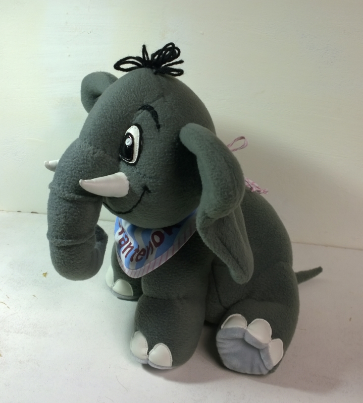 Custom grey elephant stuffed animal Custom grey elephant stuffed animal sewn to order: long trunk, wide soft ears and a pink ribbon tying the bib