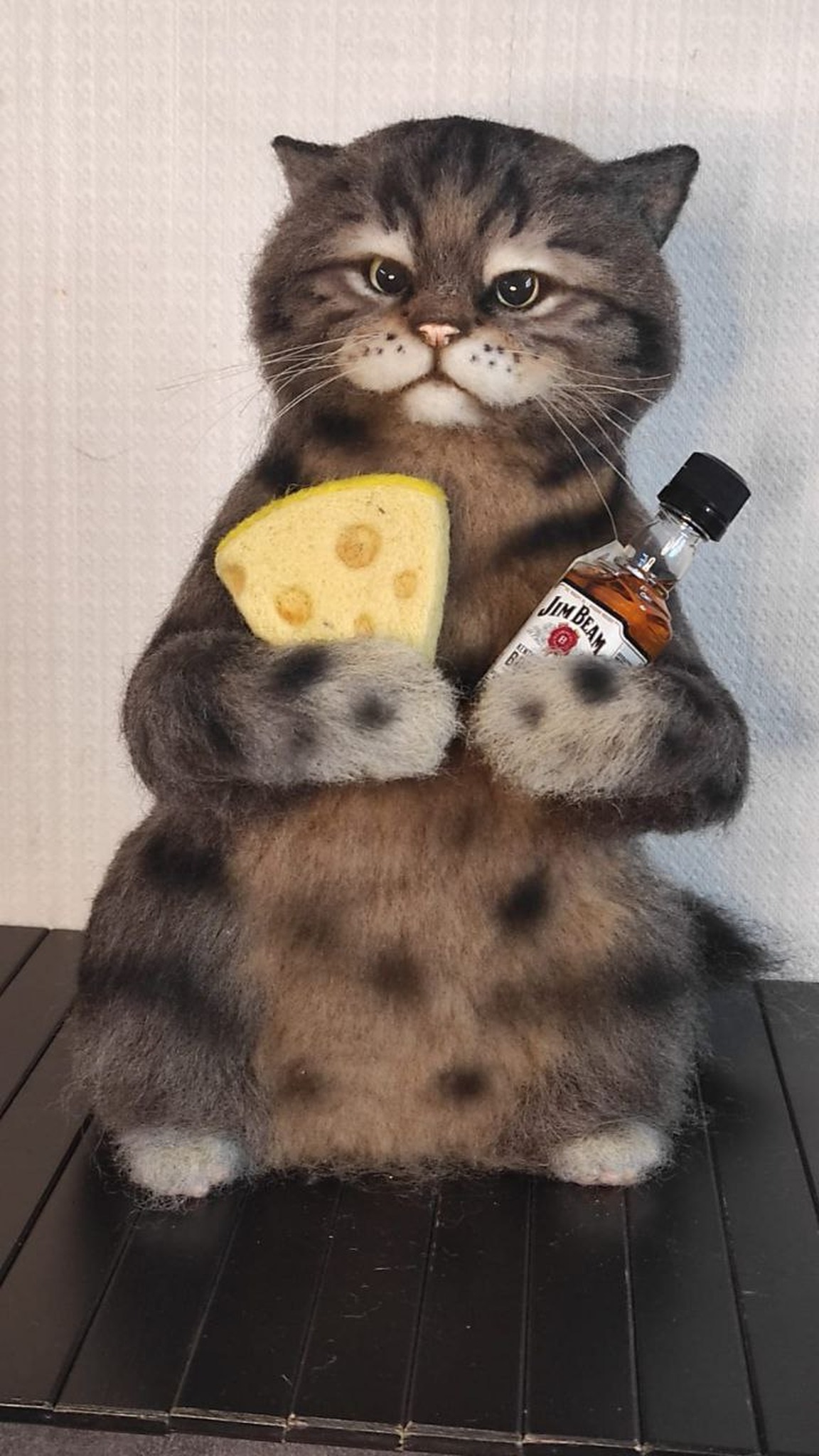 Grey tabby cat plush from a sticker, handmade to order: spotted belly, white toes, cheese and whisky bottle