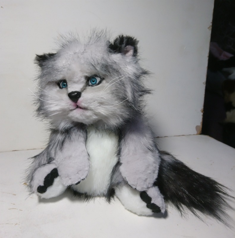 Grumpy cat plush with a bushy tail Custom grumpy cat plush of a grey kitten with a bushy black and grey tail and striped paw pads, made to order