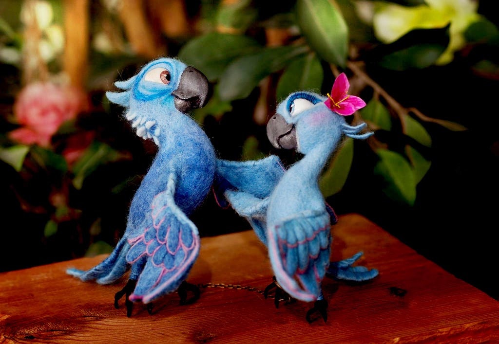 Blu and Jewel felted macaws with a chain Handmade Rio macaws Blu and Jewel in felted wool, a thin chain links their feet as in the film, made to order