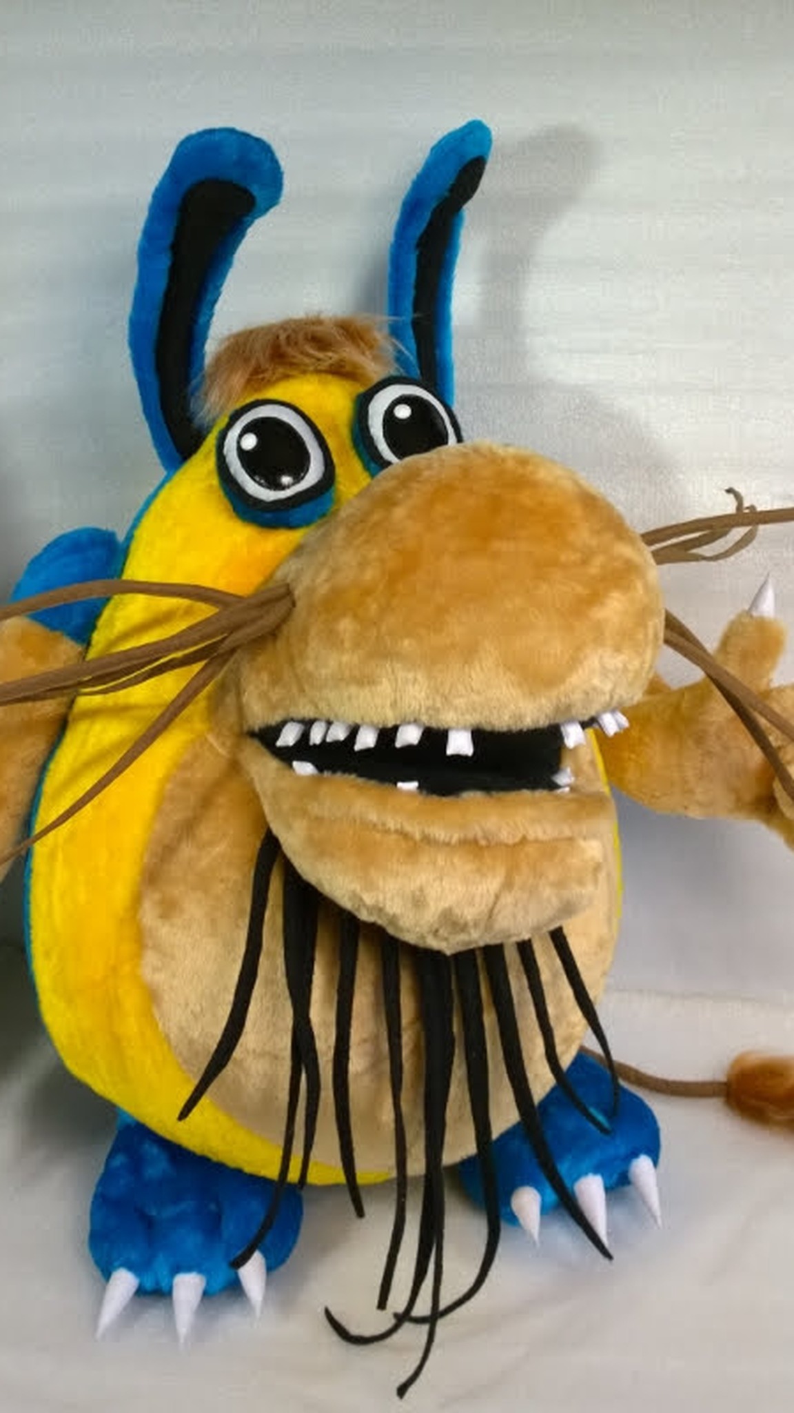 Another handmade Shtusha-Kutusha cartoon monster plush, made to order in lighter tan plush with blue feet