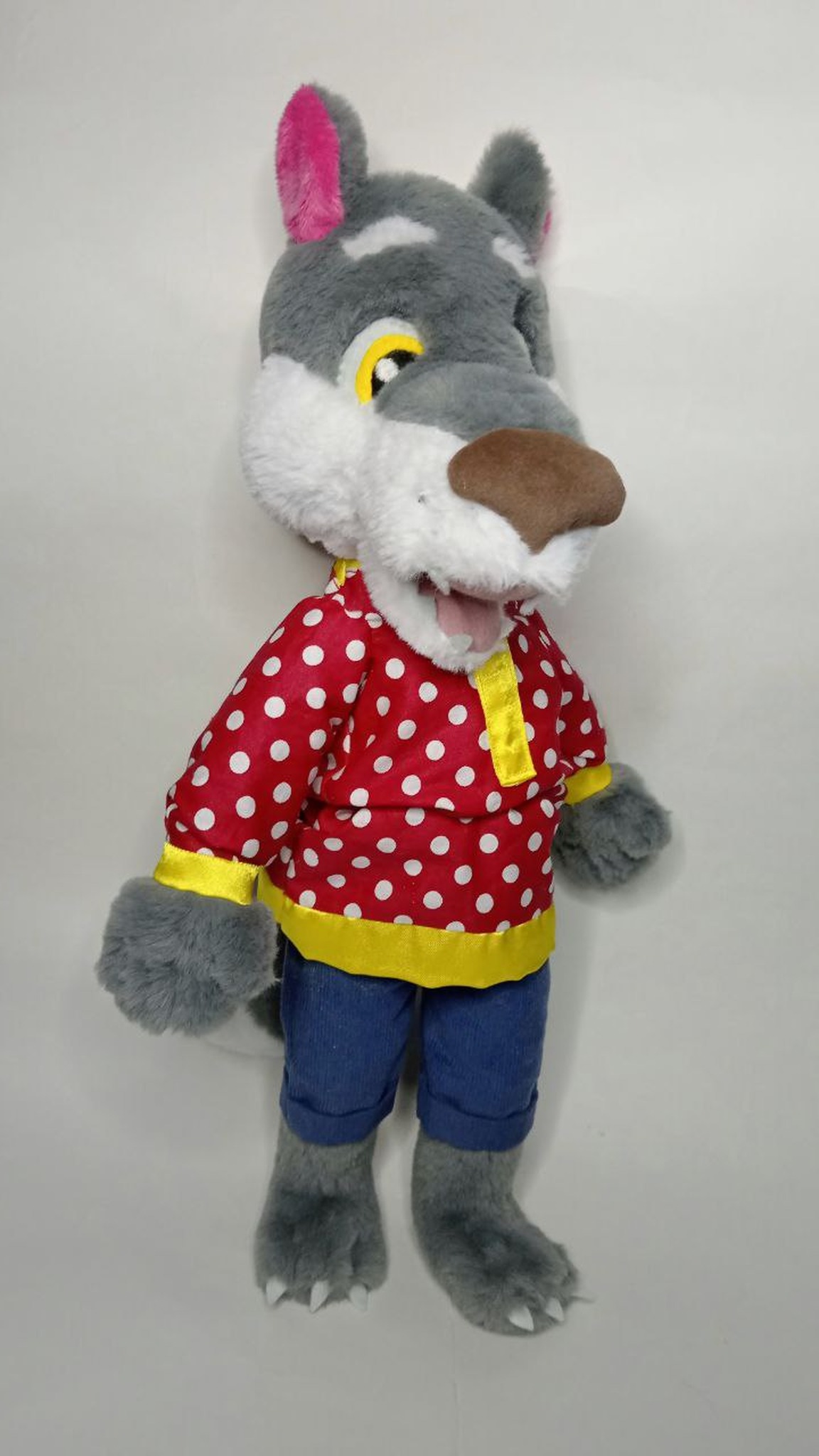 Handmade grey wolf plush made to order: yellow eyes, white chest, red polka-dot shirt, white claws