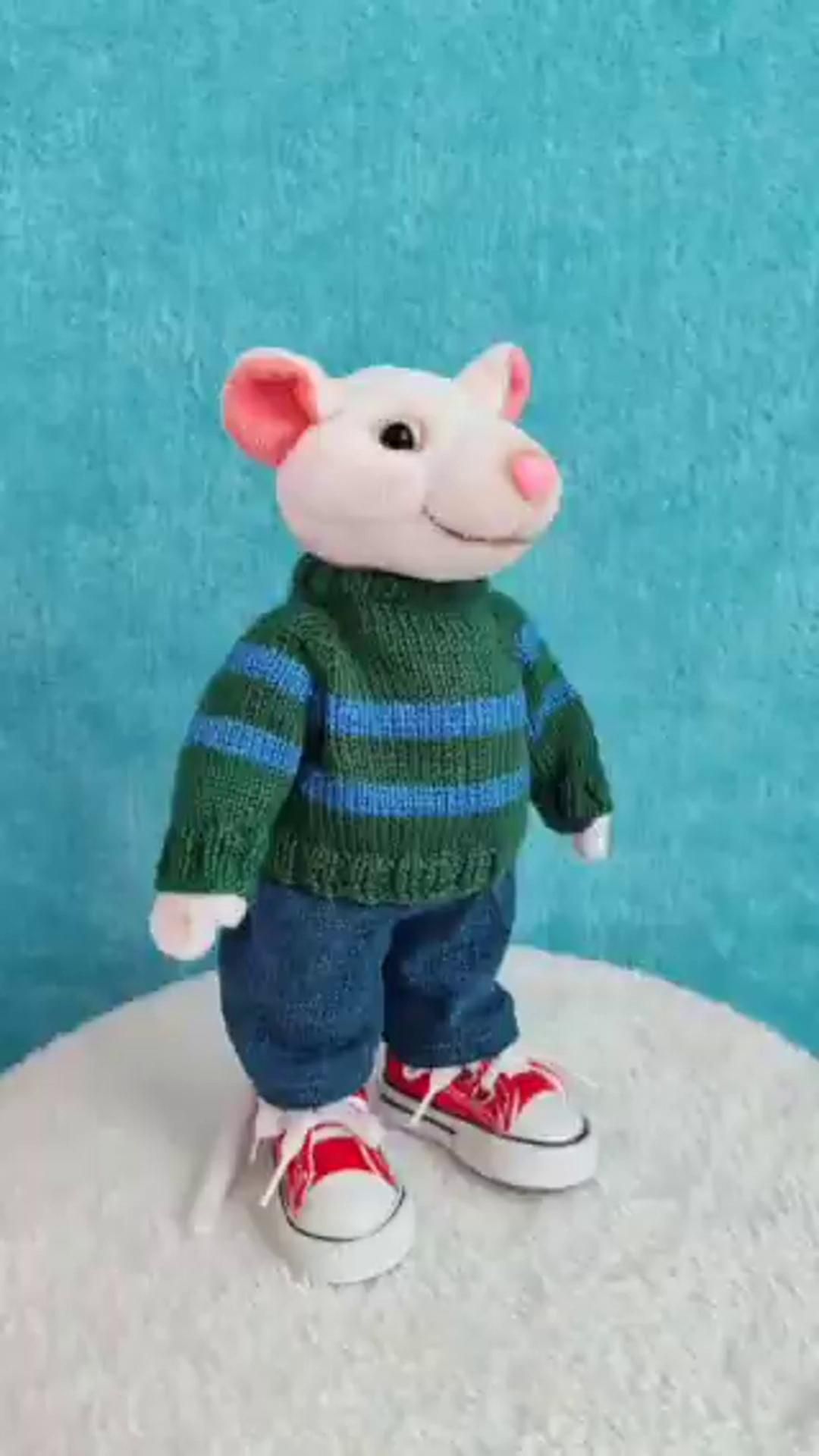 Stuart Little plush in his striped sweater Custom Stuart Little plush standing on a fluffy white rug in his blue-striped green sweater and jeans, sewn by hand