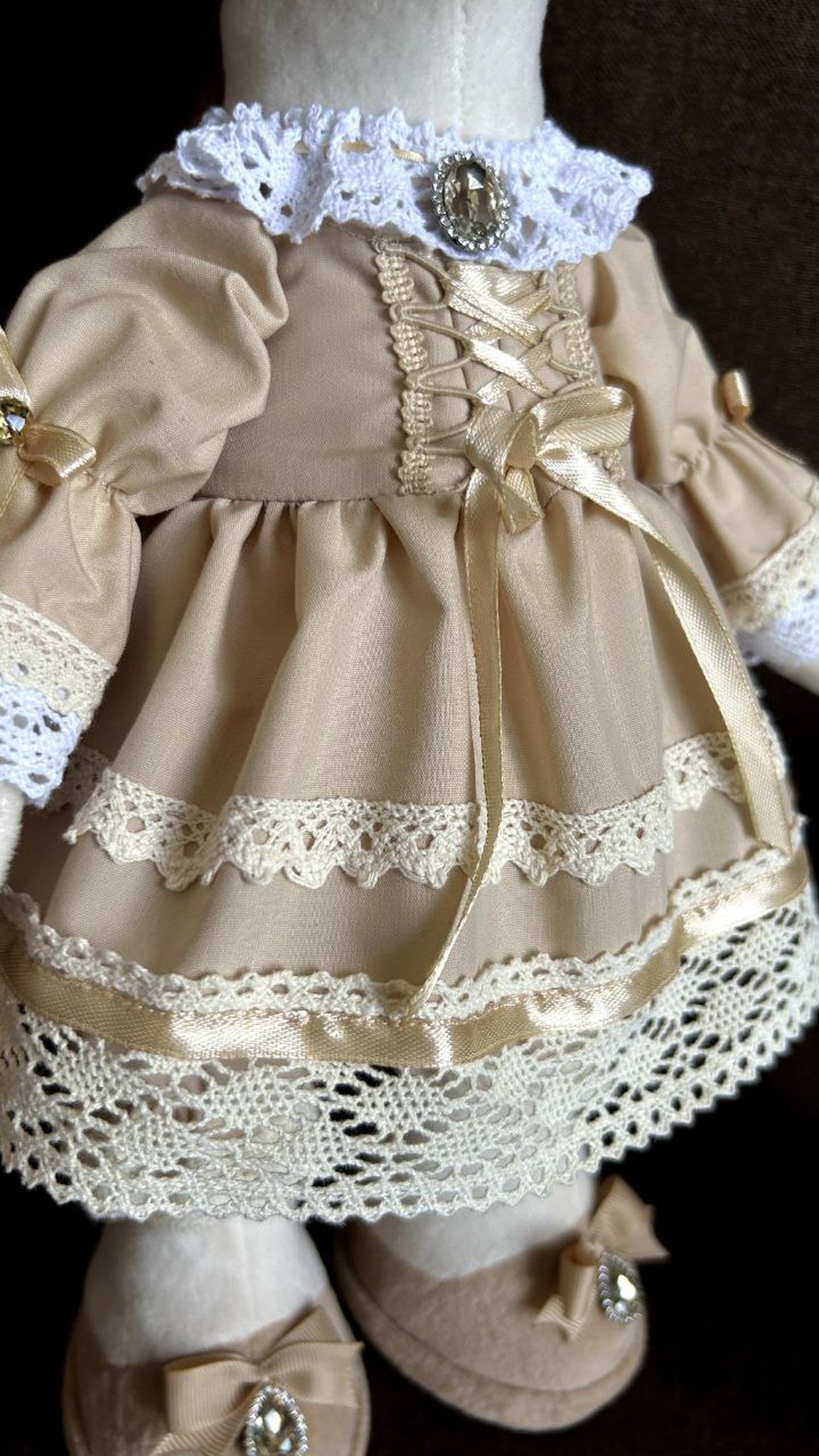 Horse plush dress with corset lacing, satin bows and lace layers, sewn by hand for a corporate gift run