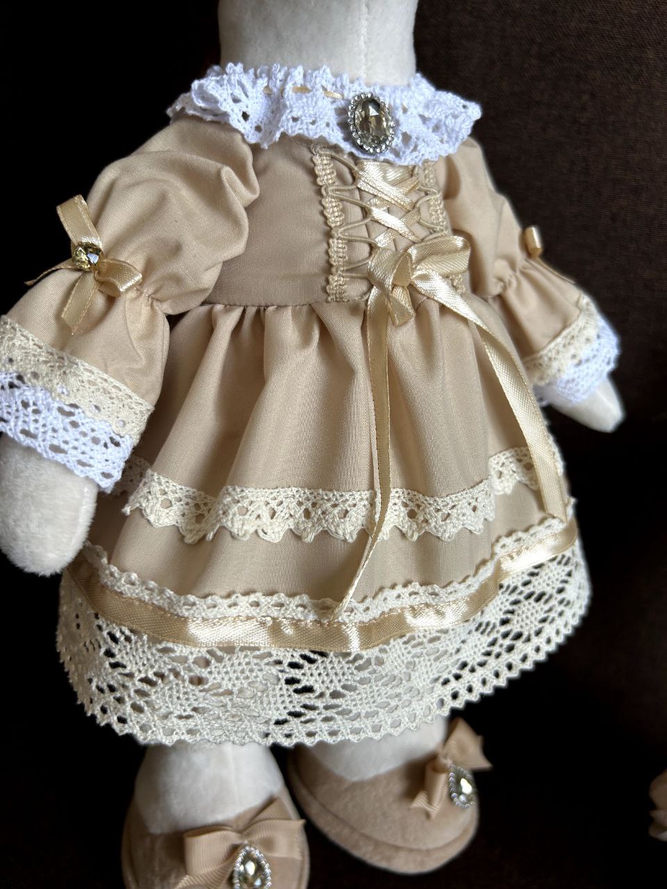Horse plush lace dress with corset lacing Horse plush dress with corset lacing, satin bows and lace layers, sewn by hand for a corporate gift run