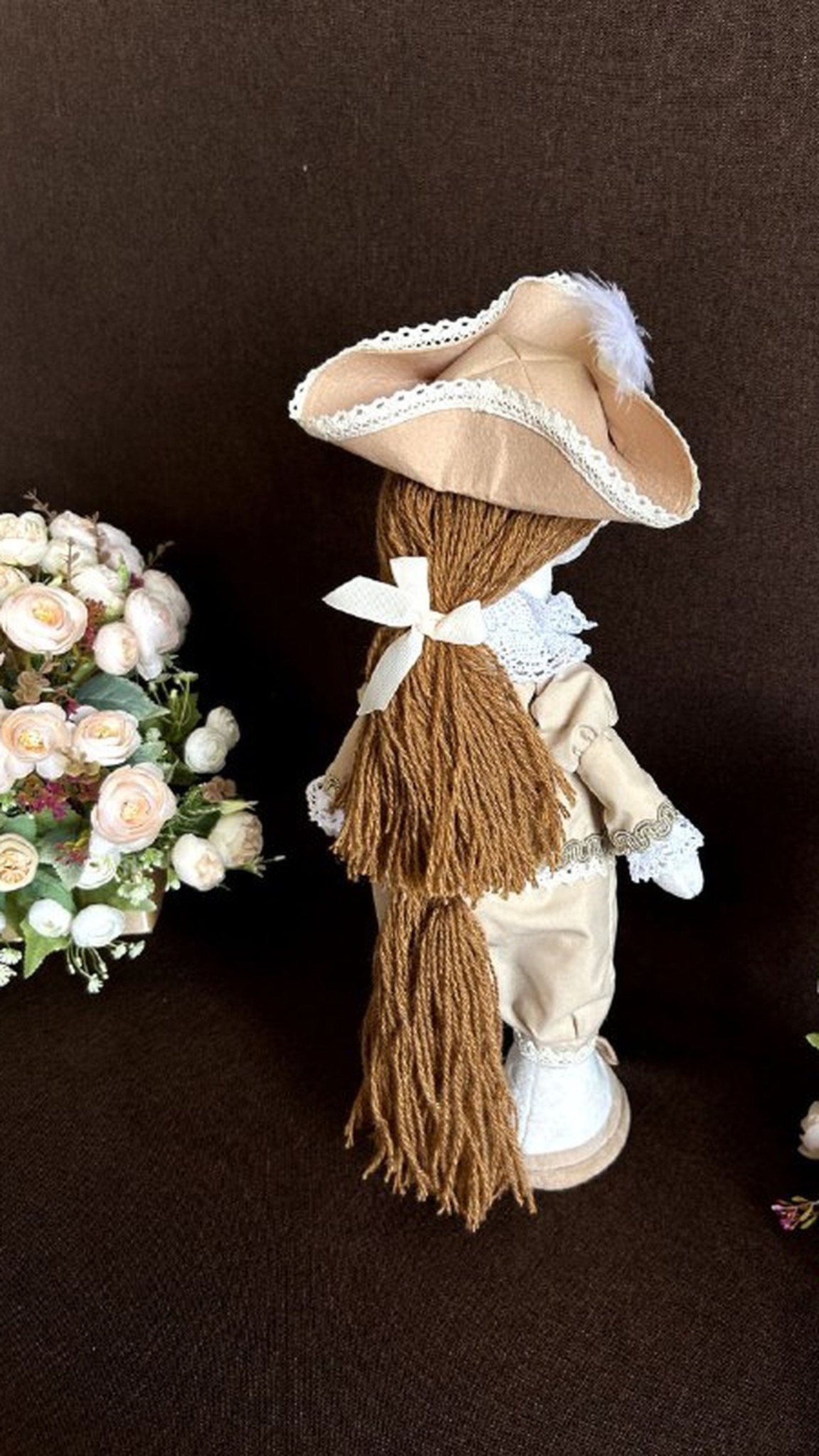 Horse plush with a long brown yarn tail, ribbon bow and tricorn hat, a custom New Year gift made to order