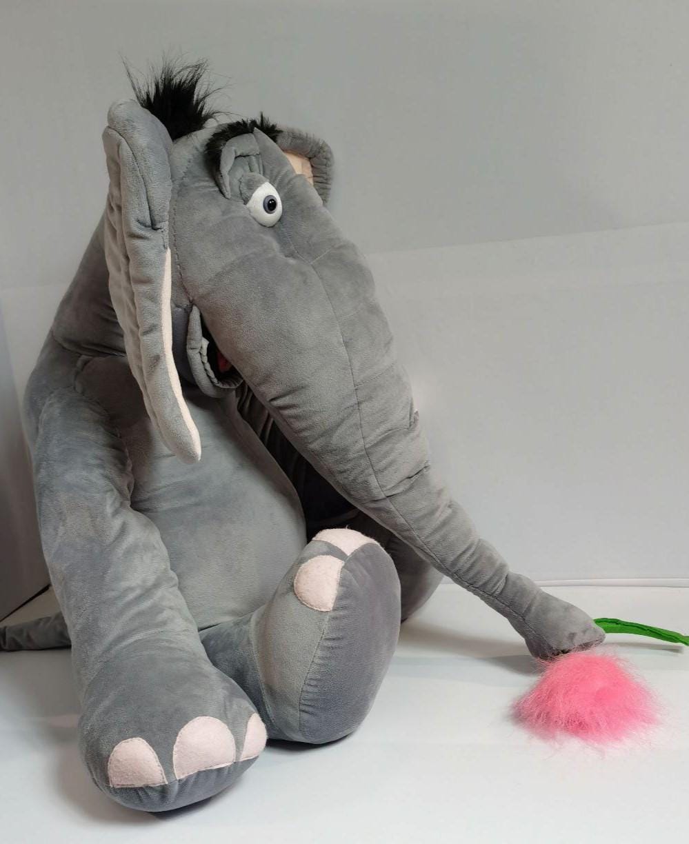 Horton elephant plush with long trunk Grey Horton elephant plush lowering his long trunk with the clover to the floor, handmade storybook toy