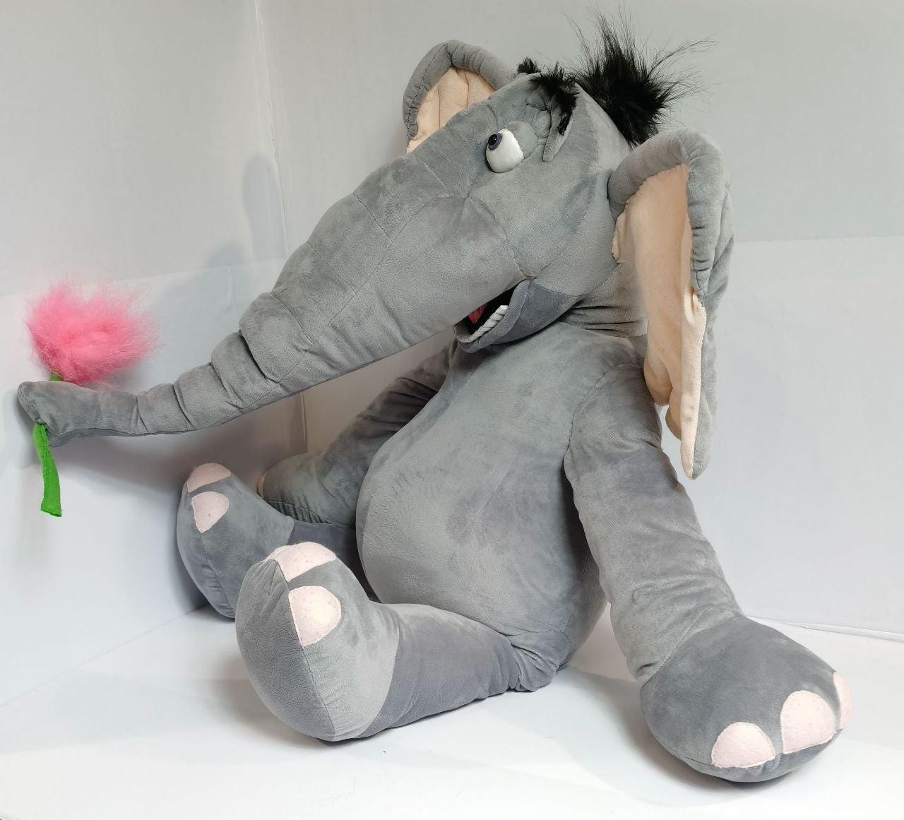 Horton plush with bendable trunk Horton plush with a bendable trunk stretched out to hold the pink clover, big grin, custom elephant toy
