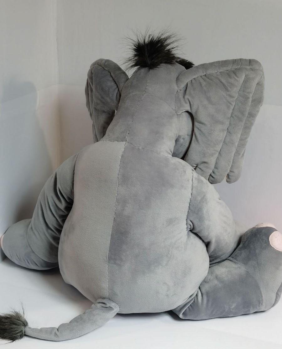 Horton plush with tufted tail Horton plush from Horton Hears a Who! with a small tufted tail and black faux fur hair, sewn by hand to order