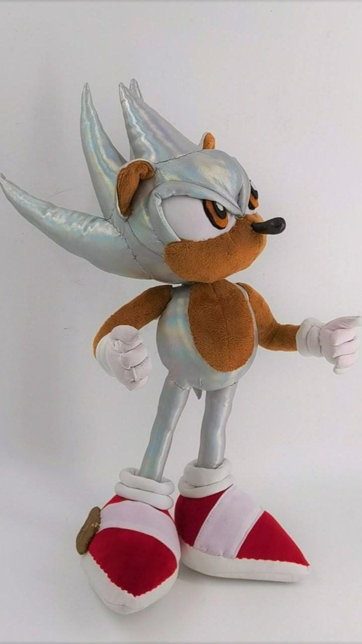 Custom Hyper Sonic plush in holographic silver with tan arms and red shoes, a Sonic fan plush made to order