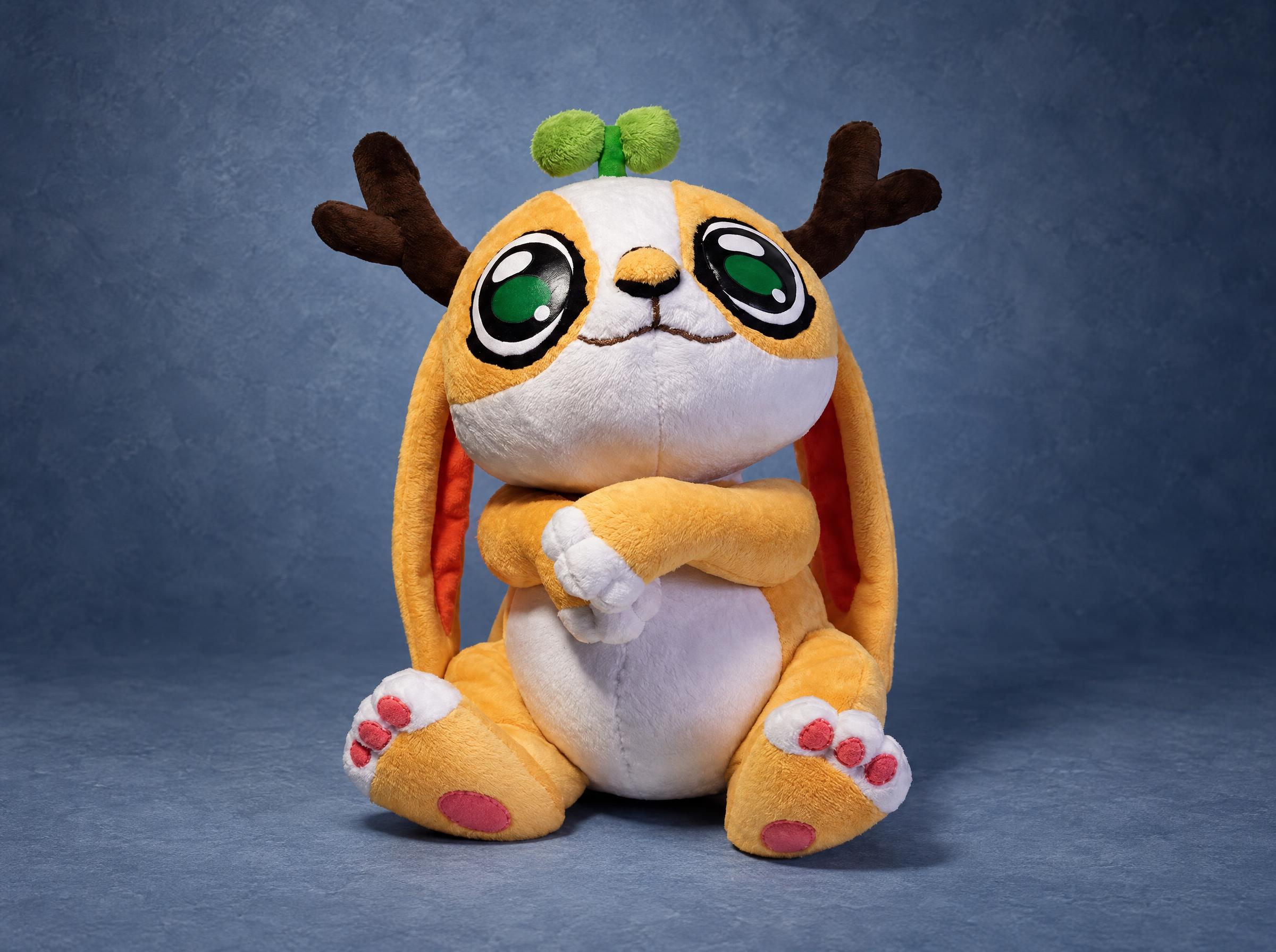 Jackalope plush from a drawing: golden bunny with brown deer antlers and a green leaf sprout, handmade to order