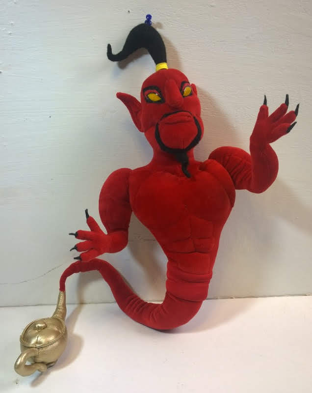 Red Jafar genie plush with black claws Red Jafar genie plush with yellow eyes, black goatee and long black claws, tail in a golden lamp, made to order