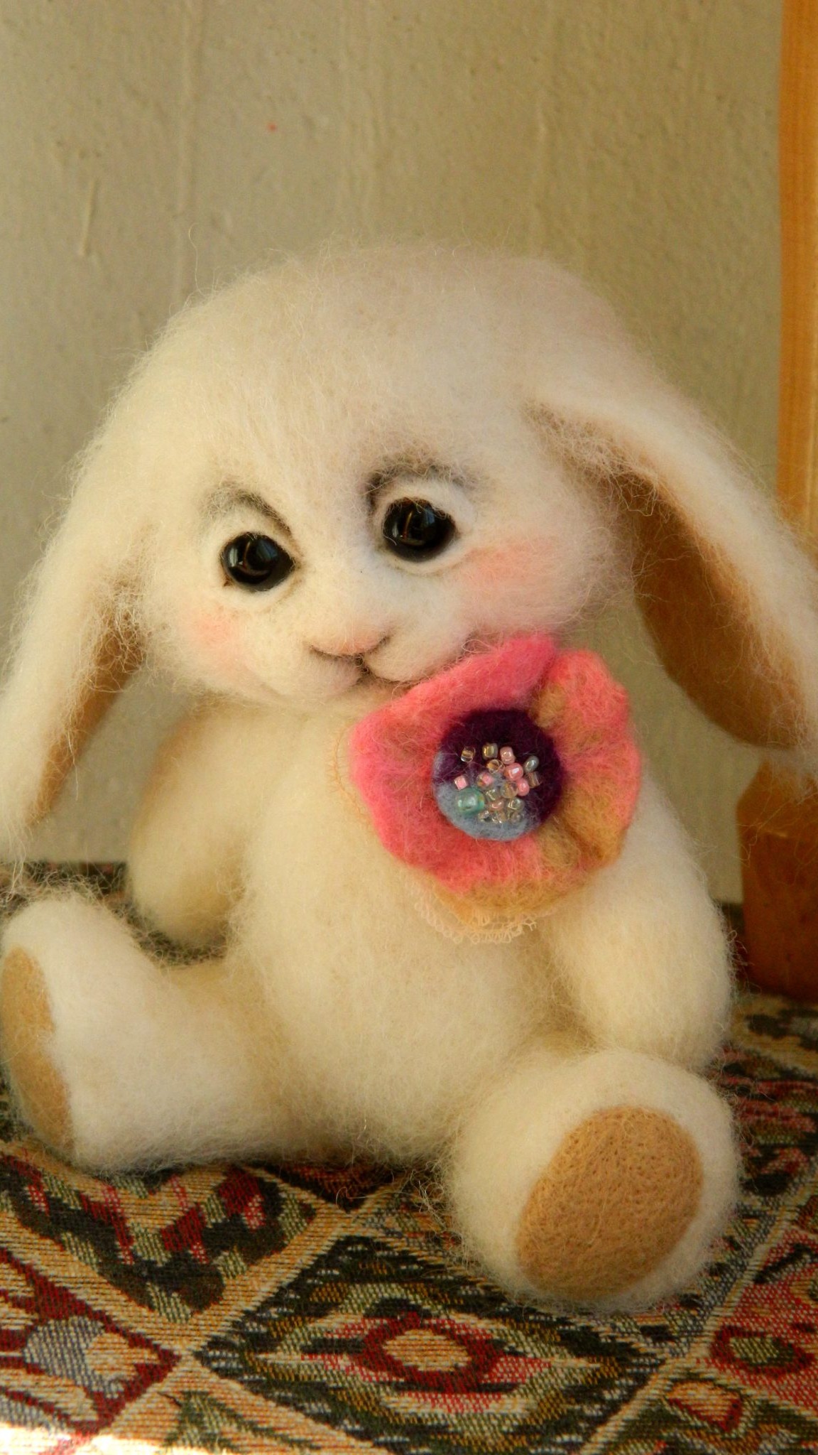 Jointed felted bunny made to order: head and paws move on cotter-pin joints, white wool, tan paw pads