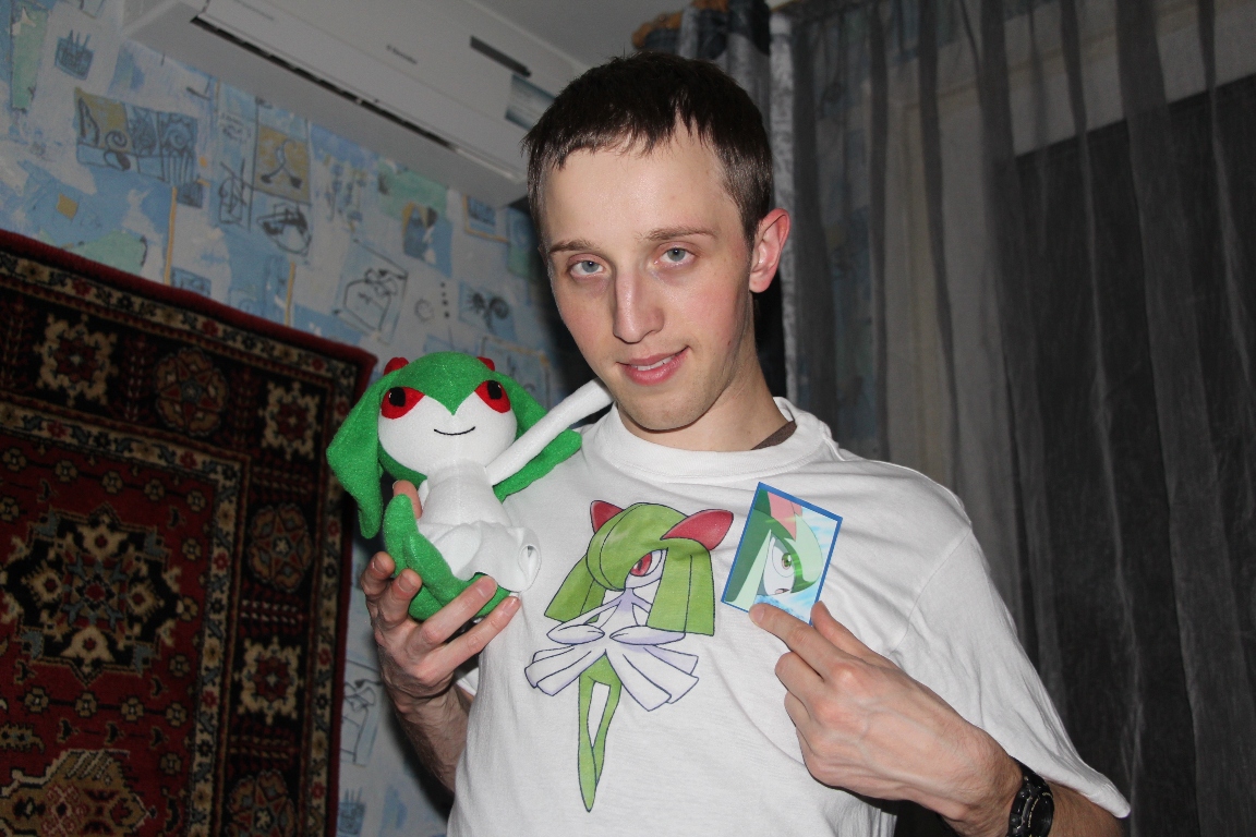 Kirlia plush with its owner Kirlia plush with green hair and red eyes on the shoulder of its owner, custom Pokémon plush made to order