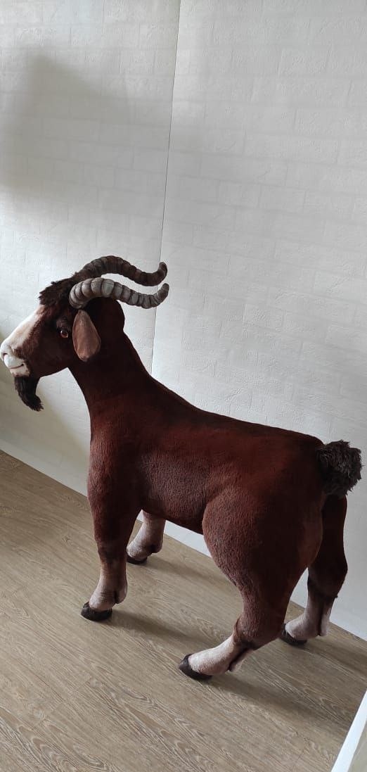 Large goat stuffed toy Large goat stuffed toy standing on four legs, brown faux fur shaded darker on the back, made to order