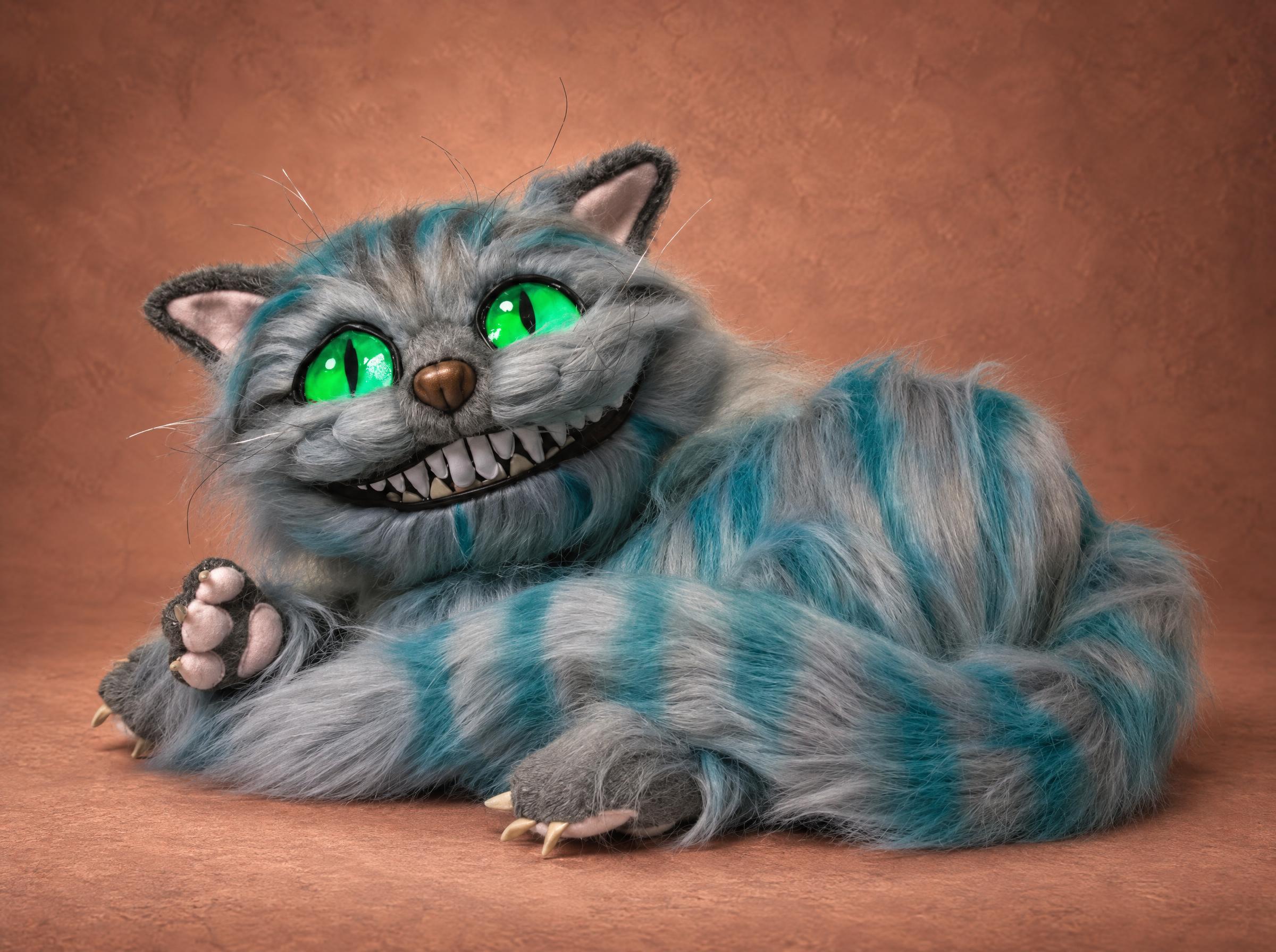 Large realistic Cheshire Cat plush in blue-grey striped faux fur, green eyes and a toothy grin, made to order