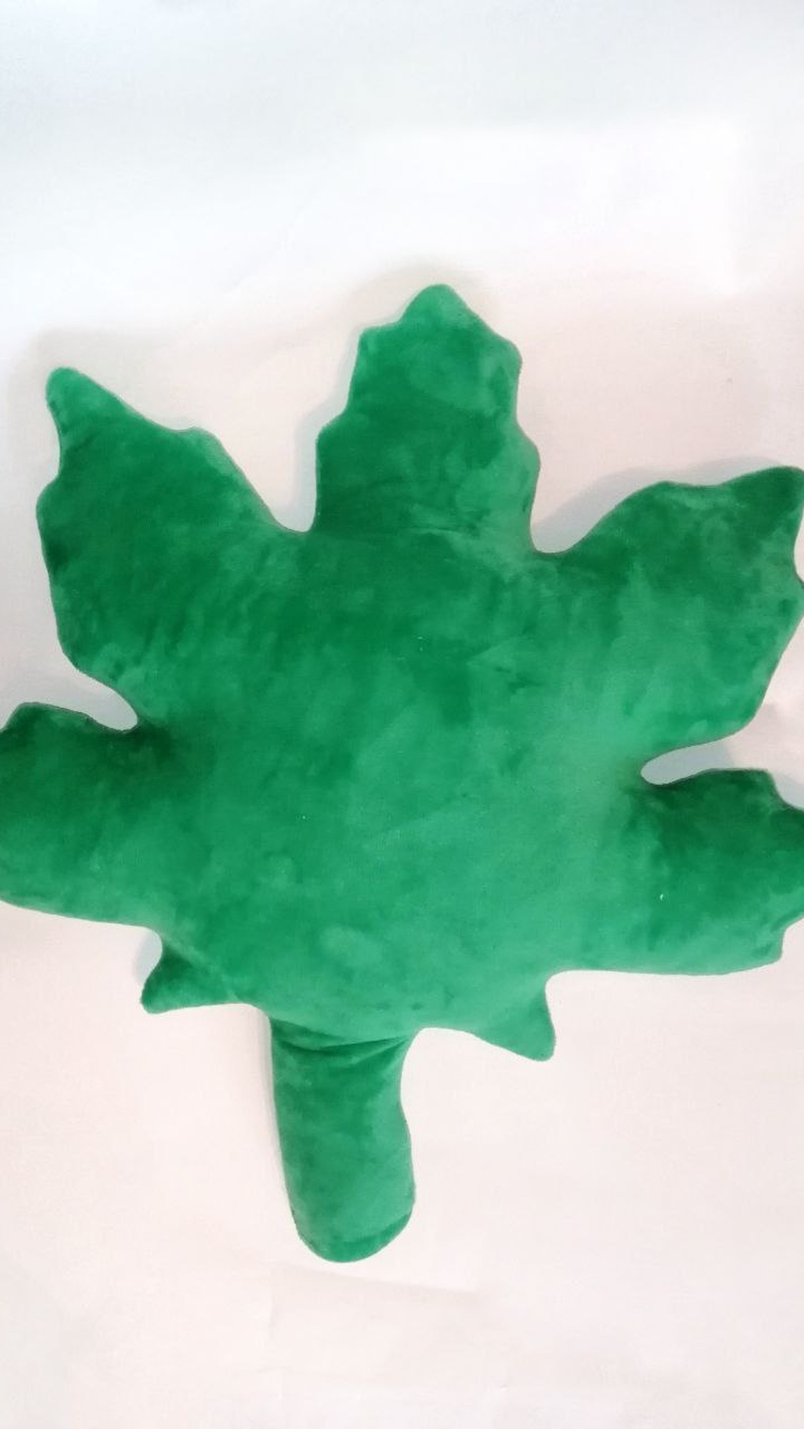 Back of the custom pot leaf plush replica: plain green plush, pointed tips and a stuffed stem, made to order