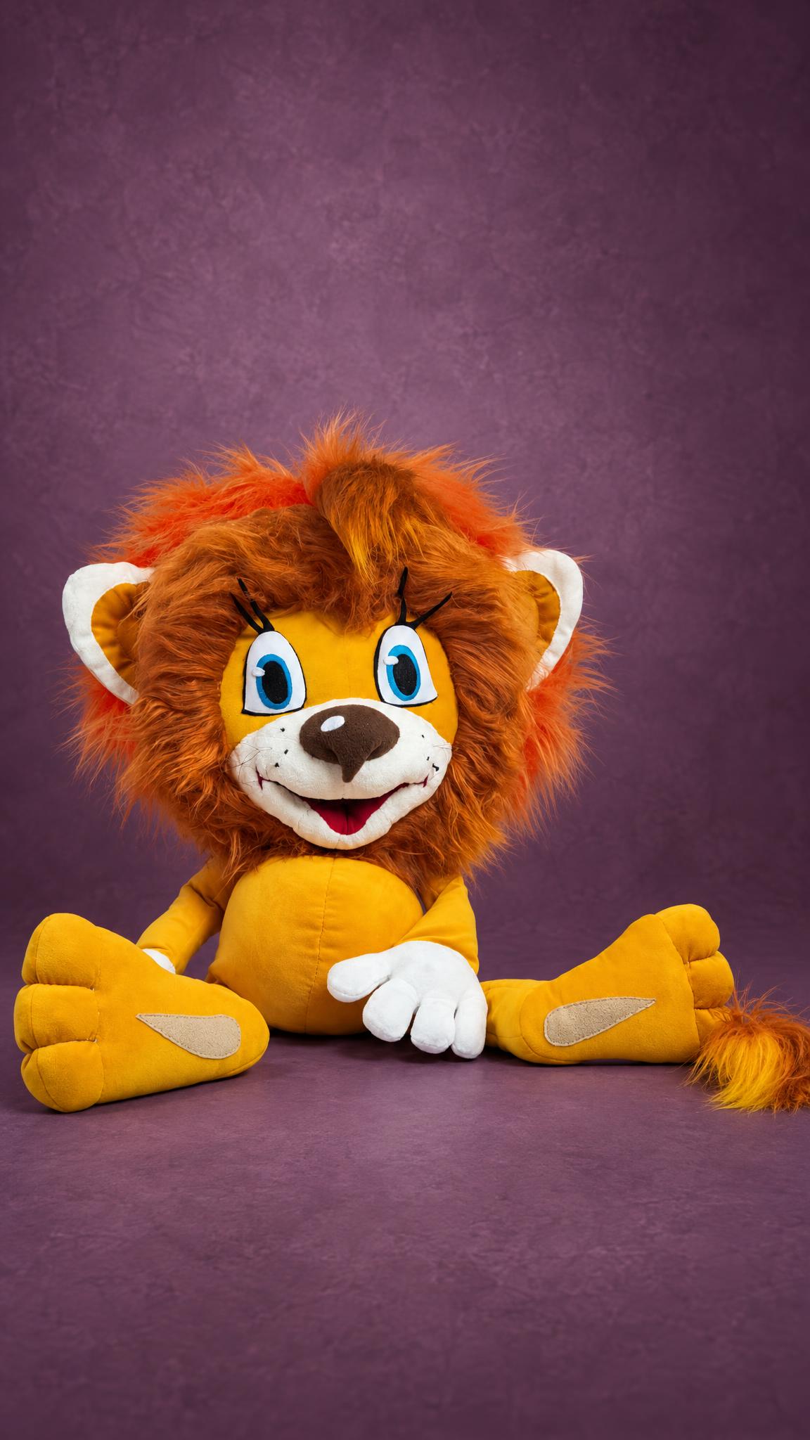 Custom lion cub plush sitting with legs stretched out, ginger mane, white muzzle and big feet, made to order