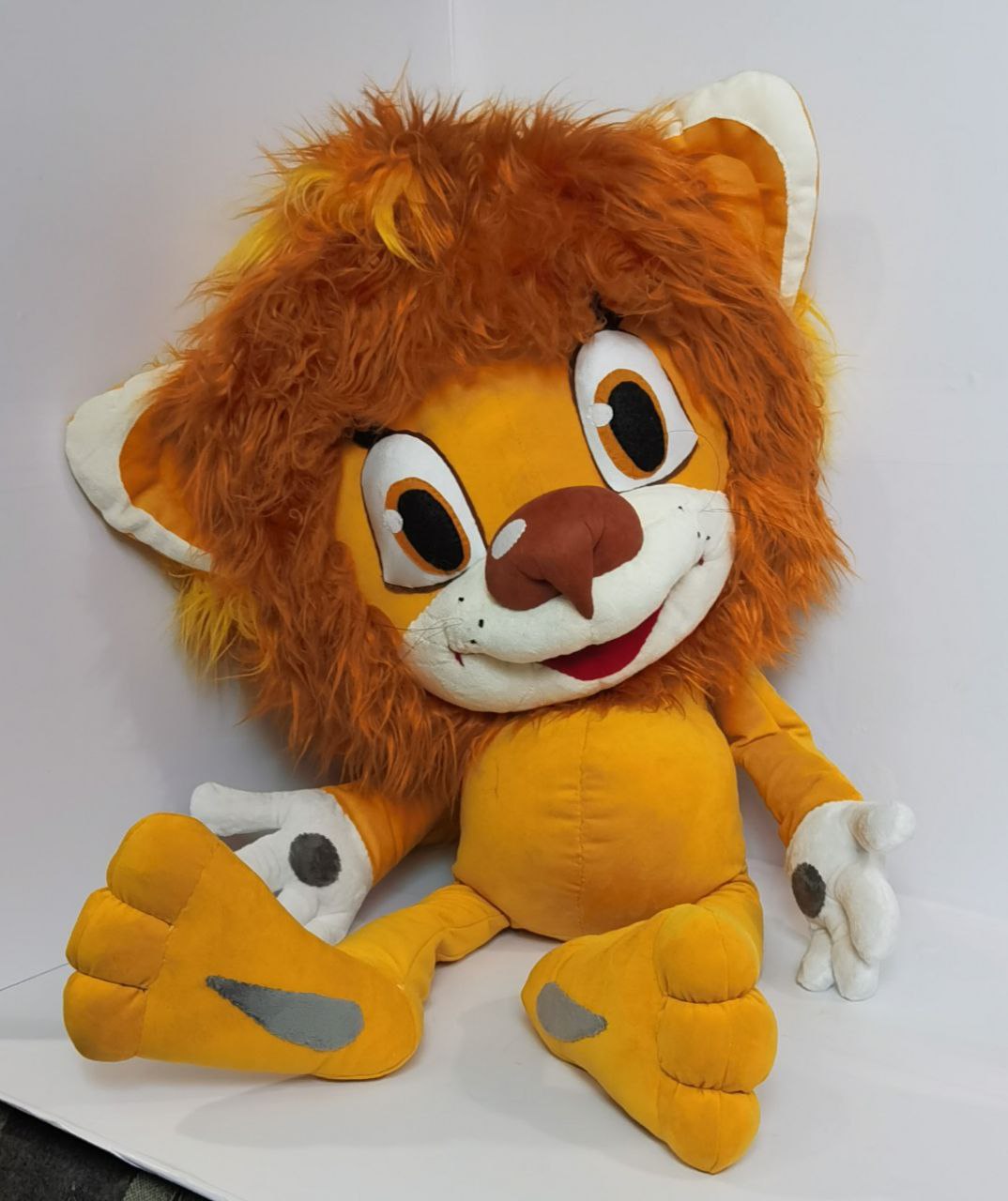 Lion cub stuffed animal with white hands Handmade lion cub stuffed animal with white gloved hands, big stitched feet and a wide smile, made to order