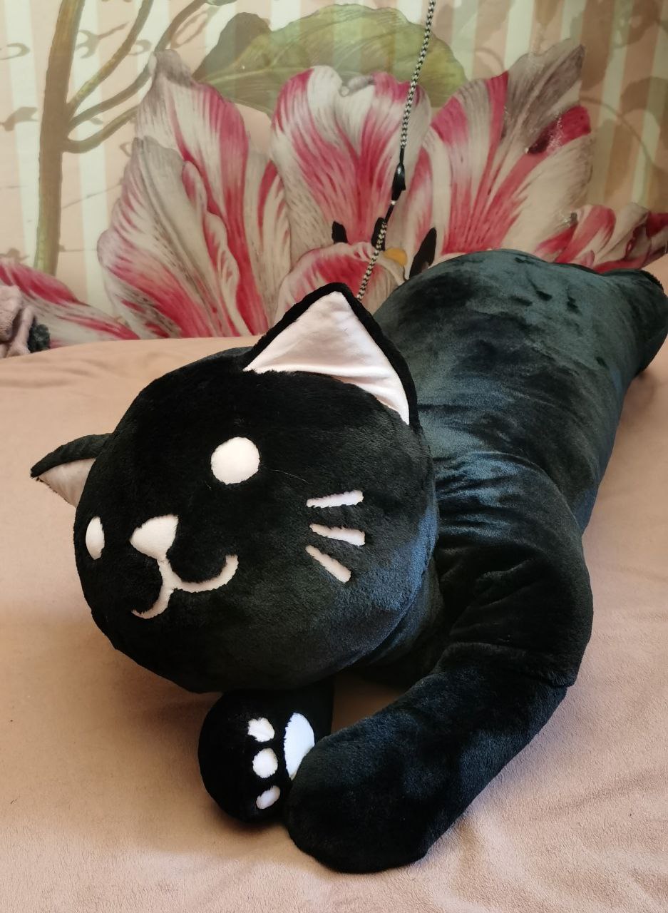 Long cat plush pillow, black cat Long cat plush pillow made to order, a sleepy black cat with white toe beans on its front paw