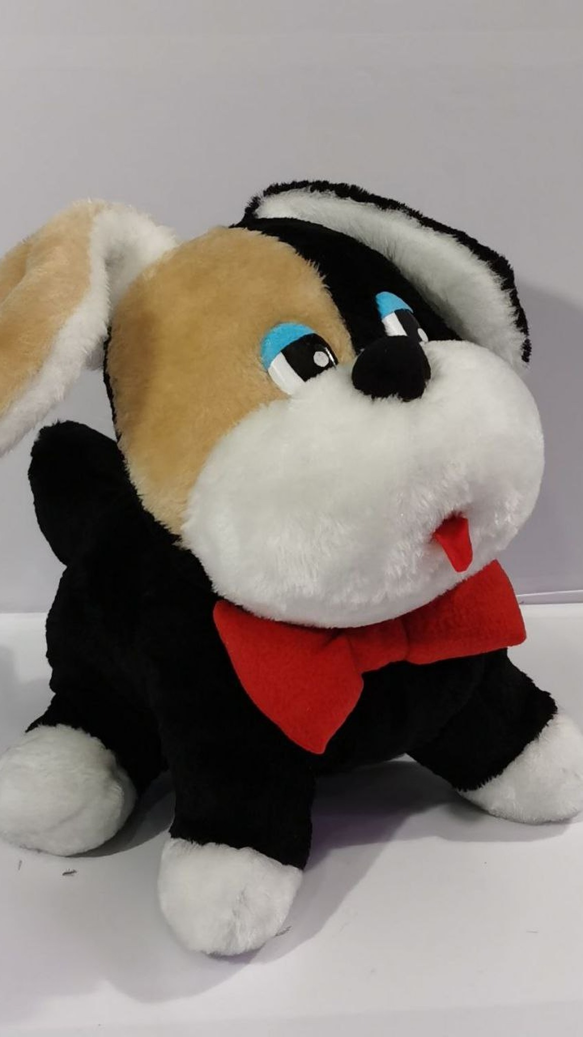 Lost childhood stuffed animal recreated as a puppy plush with white paws and red bow, made to order