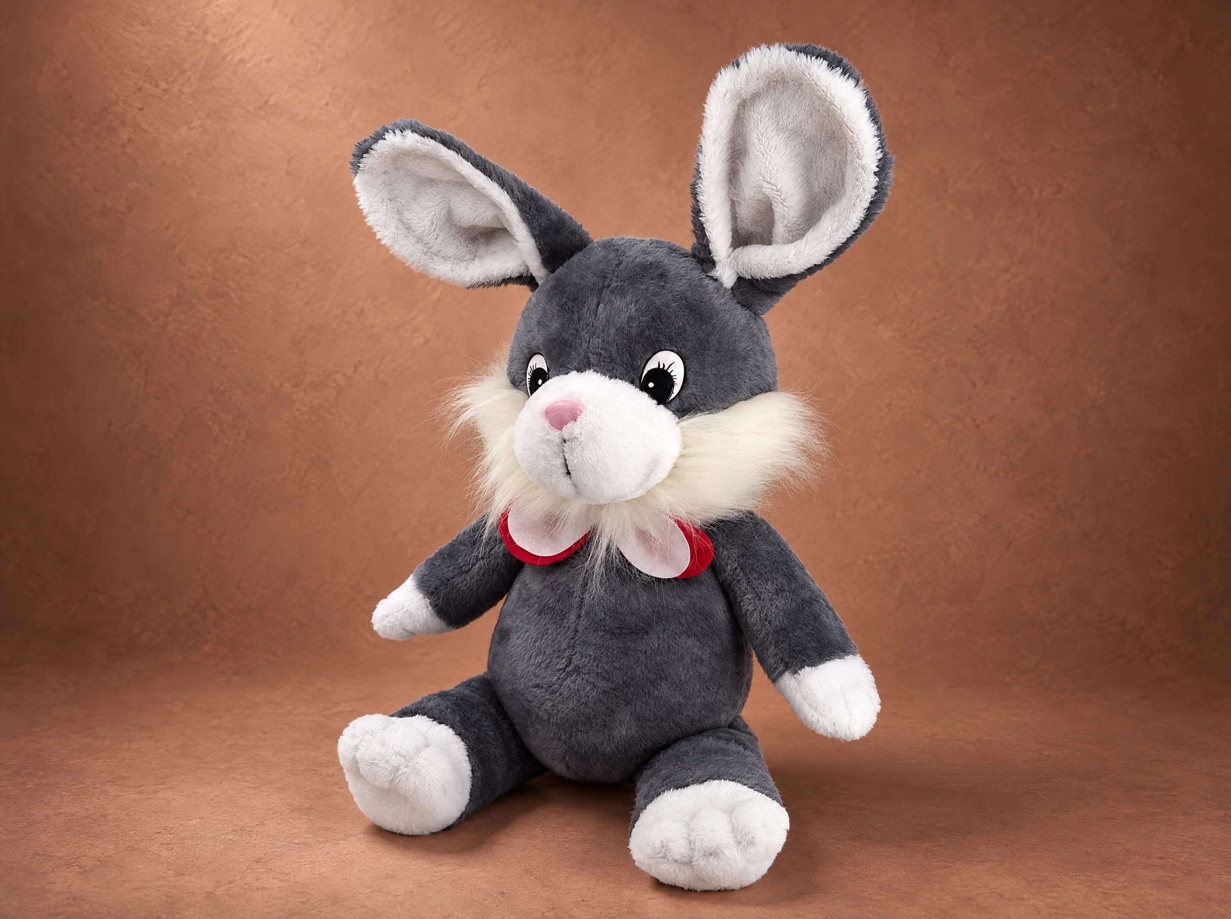 Lost stuffed bunny, remade from childhood photos Lost stuffed bunny replica in gray and white faux fur with a pink-and-red bow, handmade to order from photos