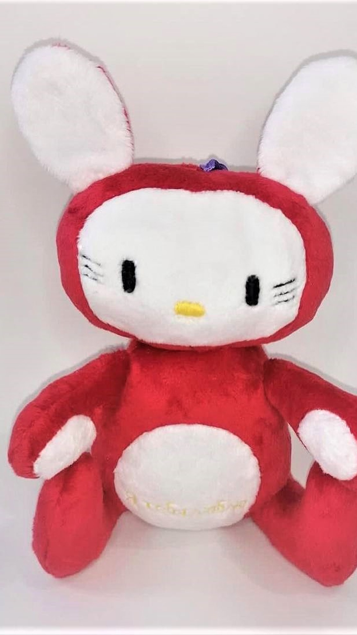 Lost toy replica of a red-pink kitty plush in a bunny suit, handmade to order from one old photo
