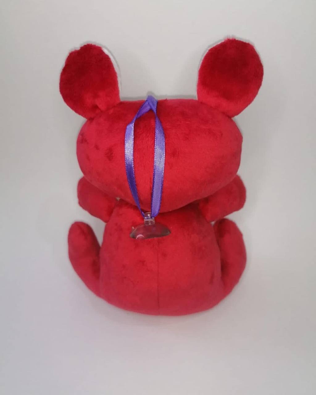 Kitty plush replica with ribbon loop Red-pink kitty plush replica with a purple ribbon loop on its head, handmade to order from an old photo