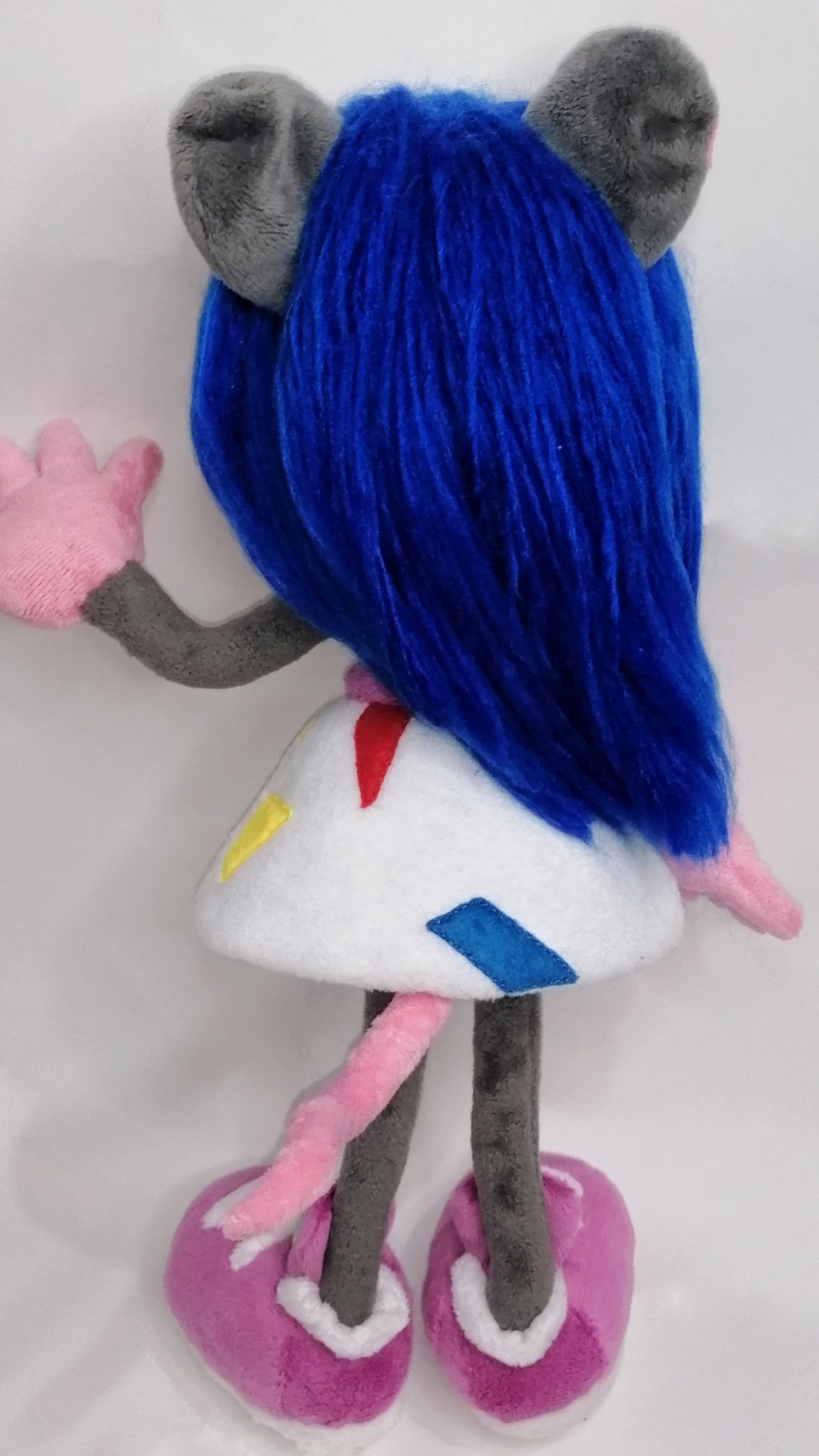 Magistra OC plush from behind: long blue hair, pink tail and white patched dress, custom mouse doll to order