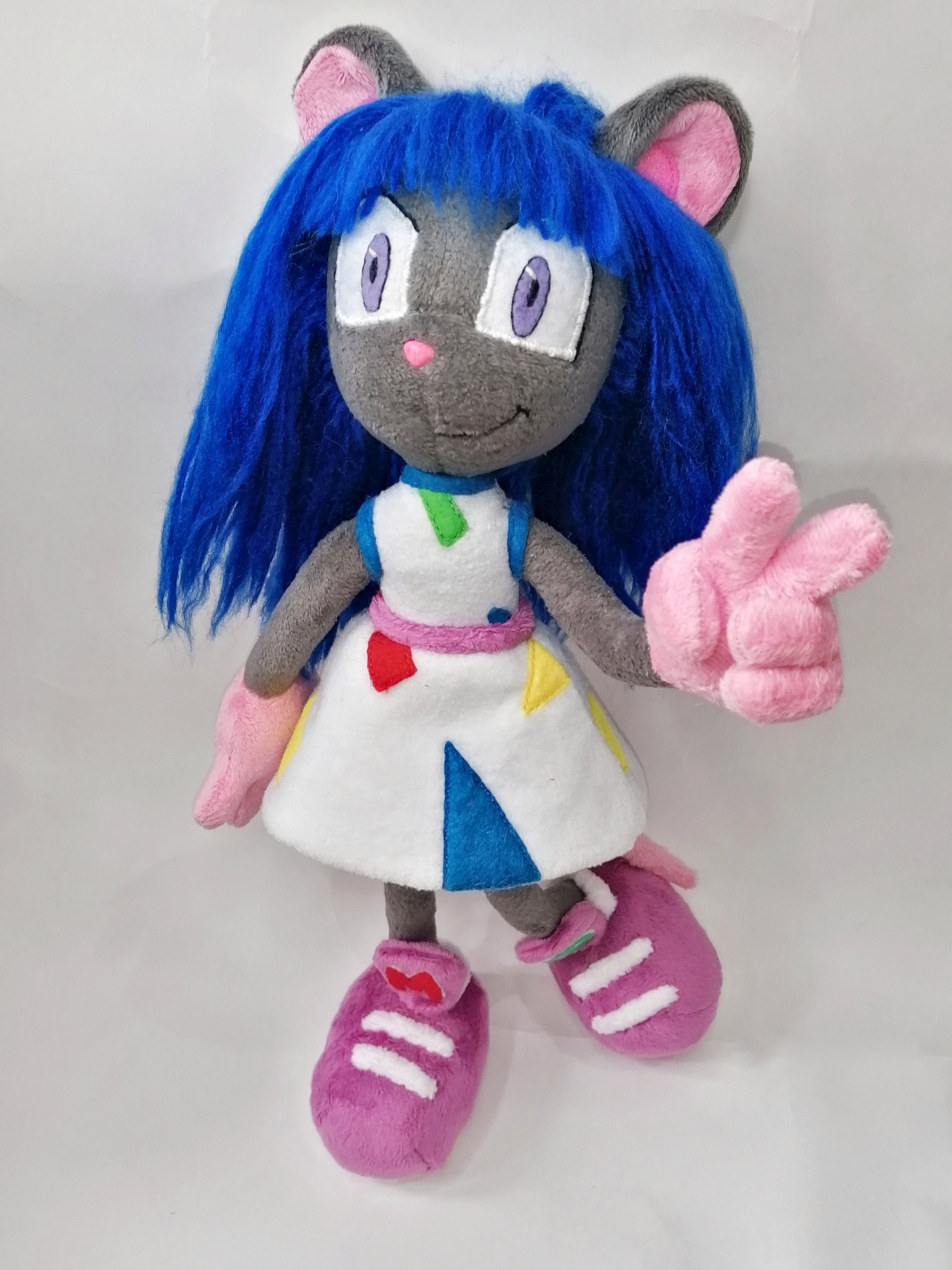 Magistra OC plush with a raised hand Custom Magistra OC plush raising a big pink hand, blue hair and white dress, Sonic-style doll made to order