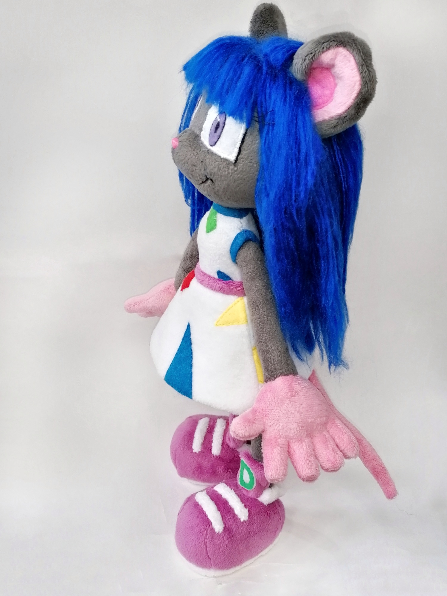 Magistra, Sonic-style OC plush Sonic-style OC plush Magistra in profile, pink tail and patched white dress, handmade mouse doll to order