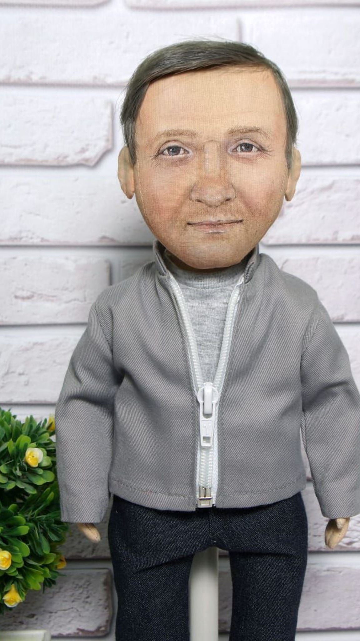 Man portrait doll made to order from photos: painted face, sewn-on ears, grey zip jacket, grey T-shirt, jeans