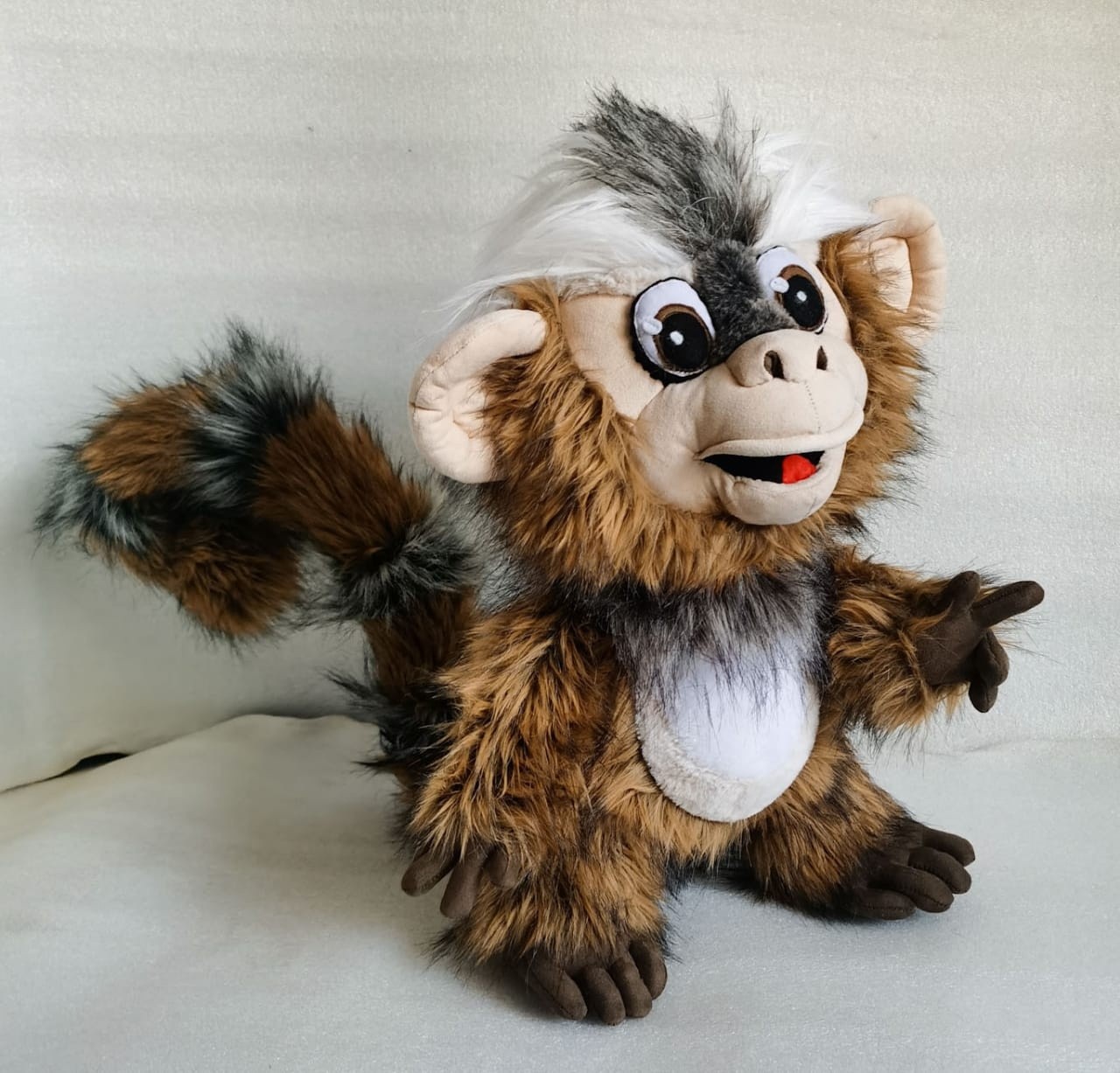 Marmoset stuffed animal Marmoset stuffed animal in streaky golden-brown faux fur, waving, with long brown fingers, made to order