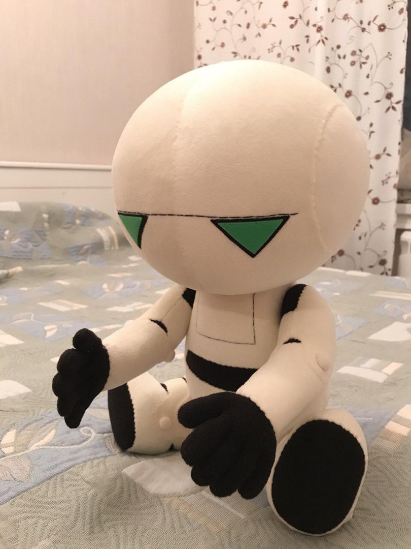 Marvin the Paranoid Android plush sitting Marvin the Paranoid Android plush sitting with his big head tilted, green eyes, handmade Hitchhiker's Guide toy
