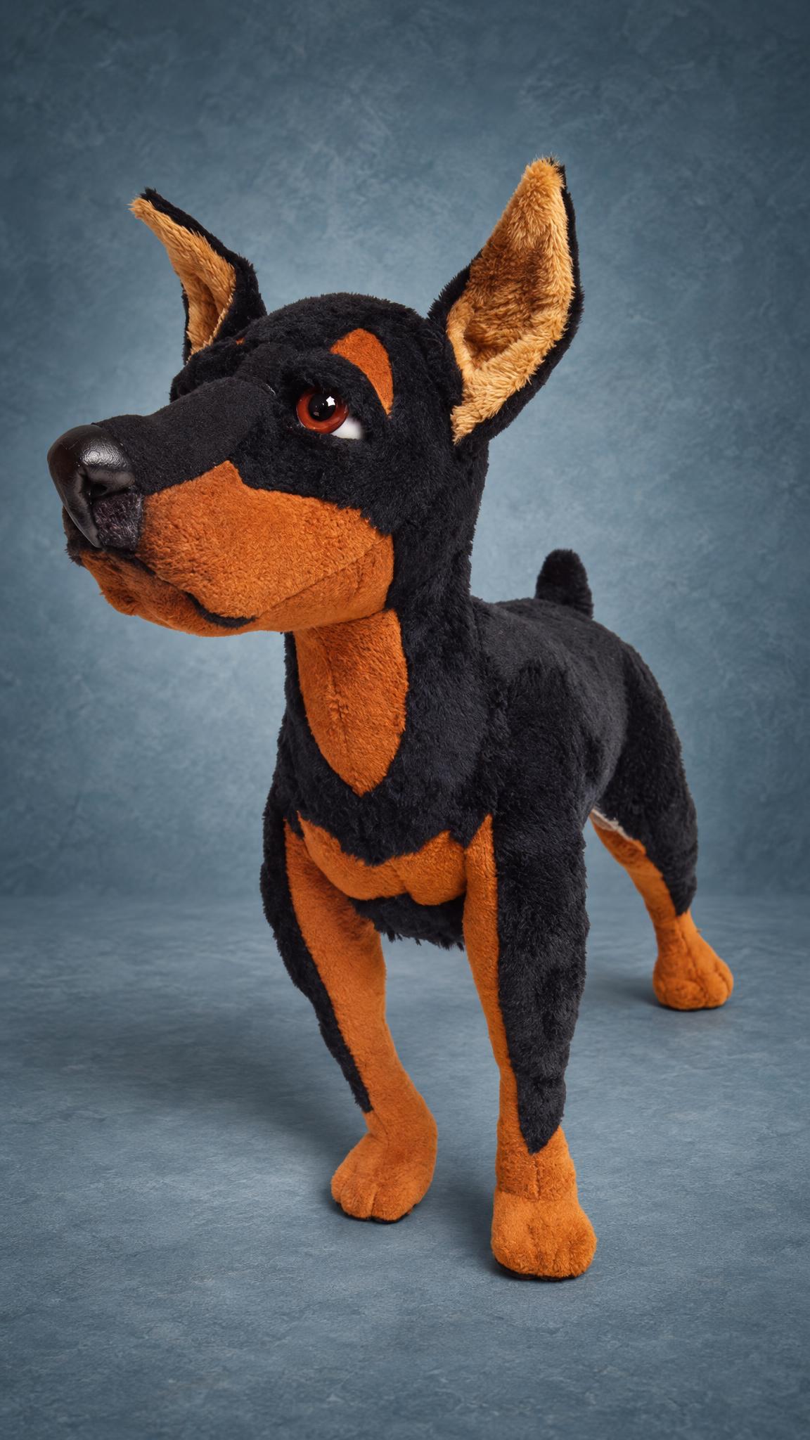 Custom min pin plush, handmade to order from photos of a beloved dog: black and rust coat, chin up, tan paws