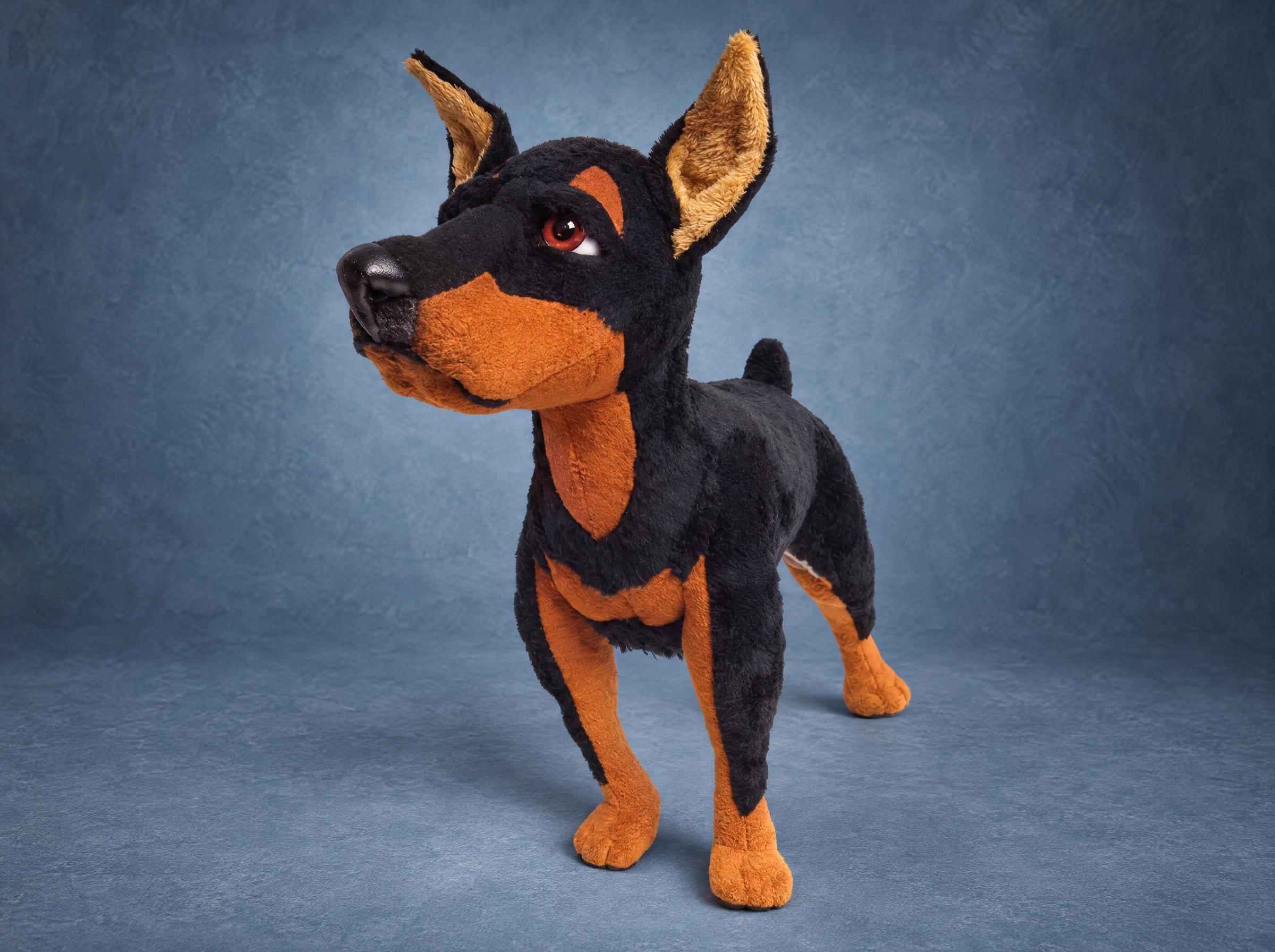 Miniature pinscher plush made to order: black faux fur with rust markings, tall tan-lined ears, standing