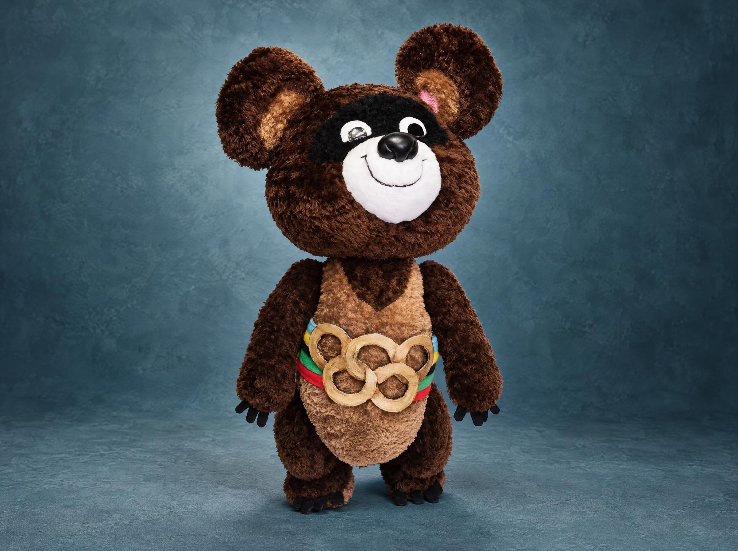 Misha Olympic bear plush sewn to order: brown curly faux fur, black mask, belt with five gold rings