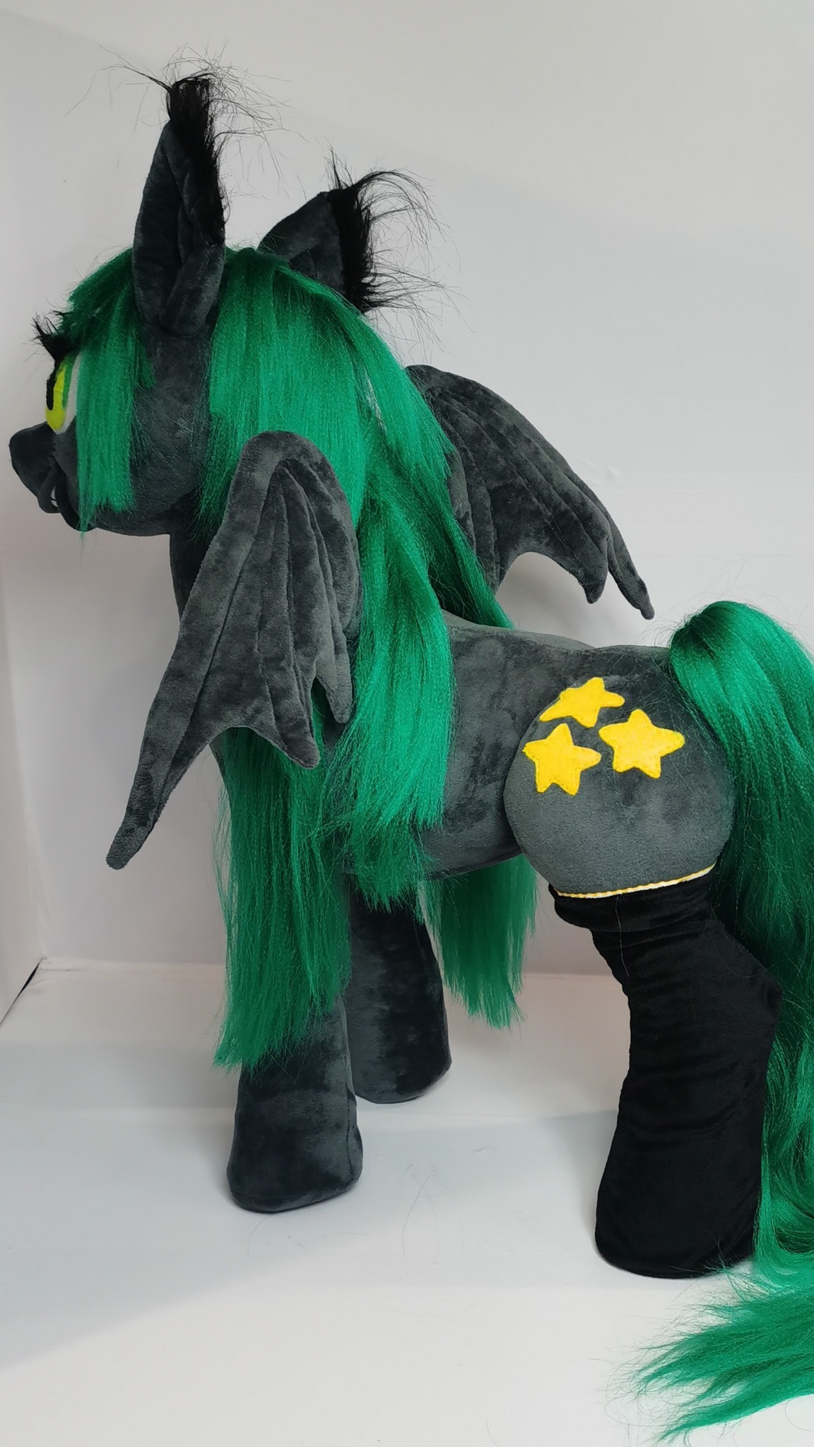 MLP OC plush from behind: grey bat wings, yellow star cutie mark and black hind socks, sewn to order