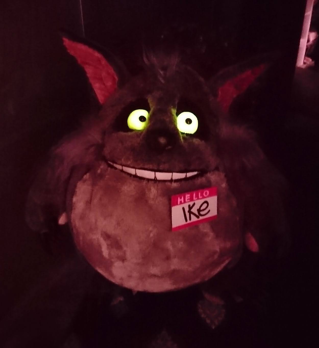 Monster wolf plush with eyes that glow in the dark Custom monster plush Ike in the dark: glow-in-the-dark yellow eyes, white grin and name badge, handmade
