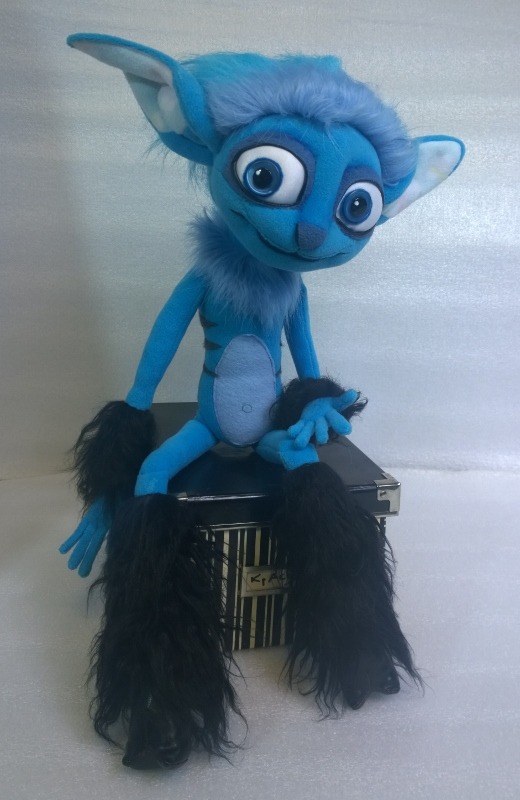 Mune plush with faux fur legs Mune plush with big glossy eyes, pale blue belly and long fingers, sitting on a box, sewn to order by hand