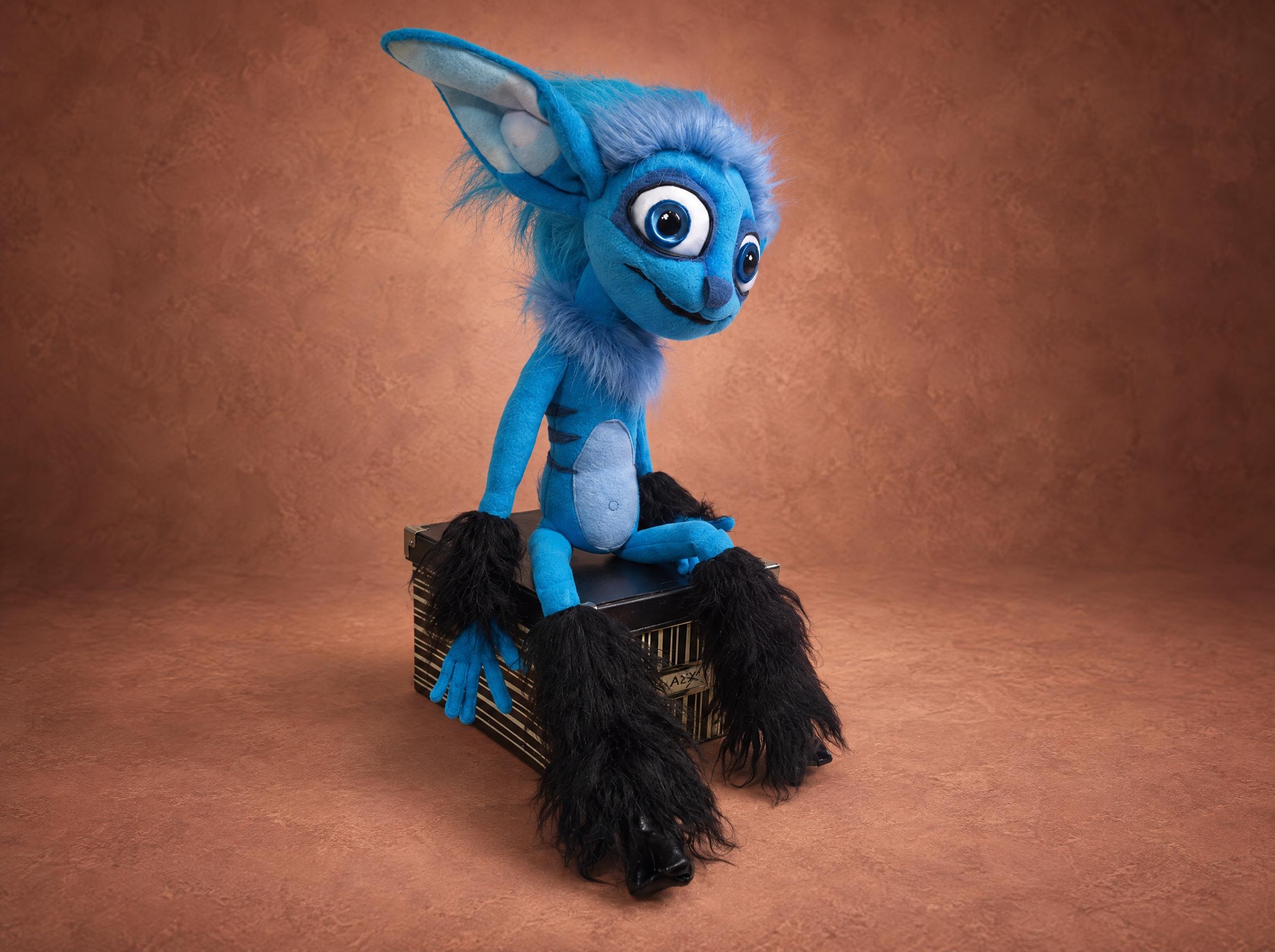Handmade Mune plush from Mune: Guardian of the Moon, blue faun with faux fur mane and black hooves, made to order