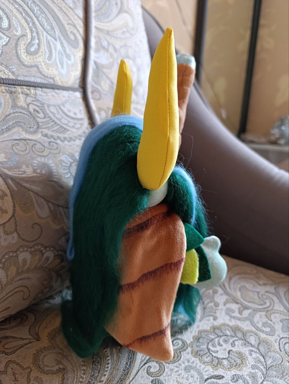 Nature’s Prophet plush with faux fur hair Nature's Prophet plush with long dark green faux fur hair, yellow horn and brown cloak, custom Dota 2 plush