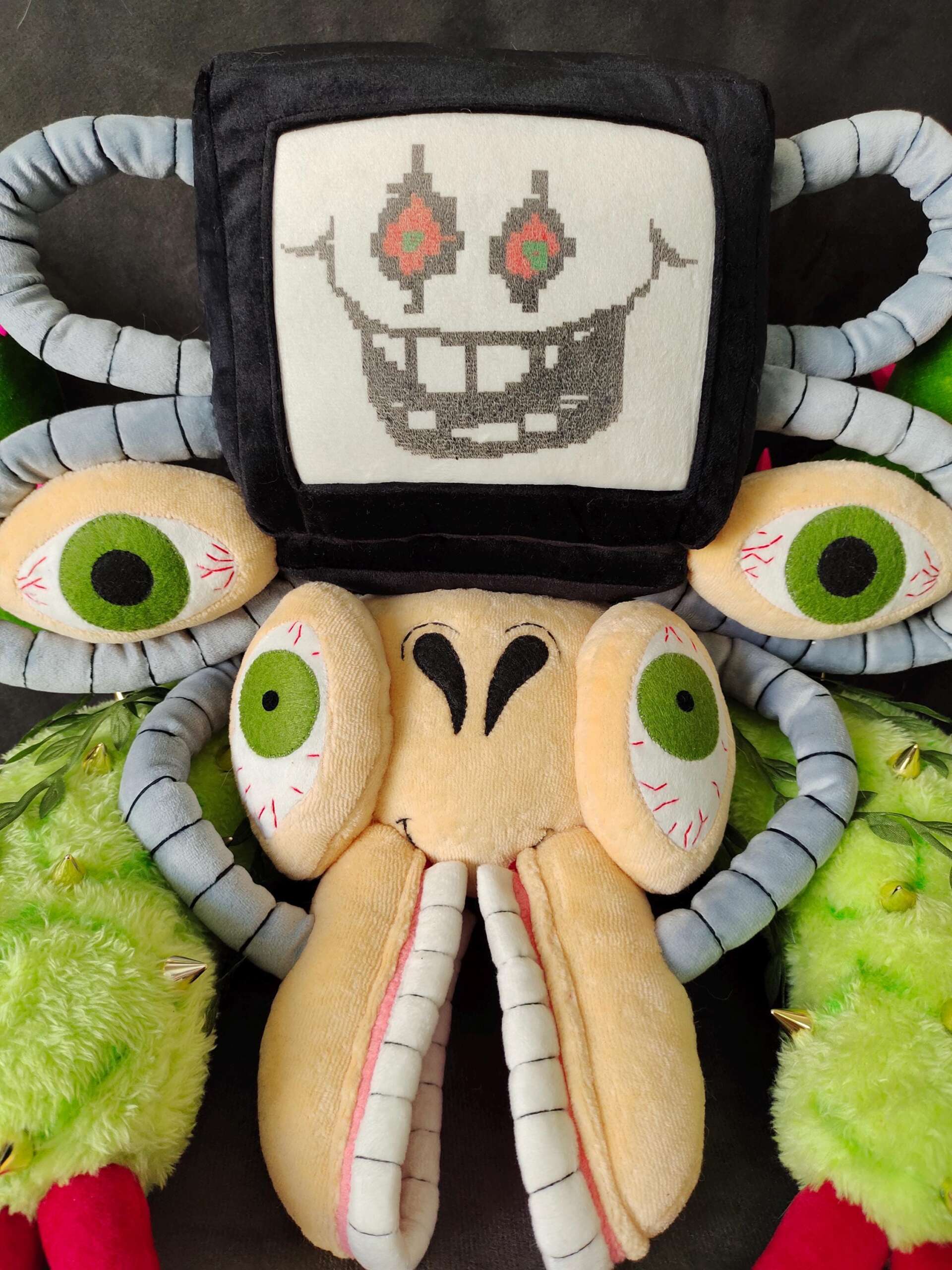 Omega Flowey Undertale plush Handmade Omega Flowey plush with a pixel-grin TV head, grey tube vines and long white teeth, sewn to order