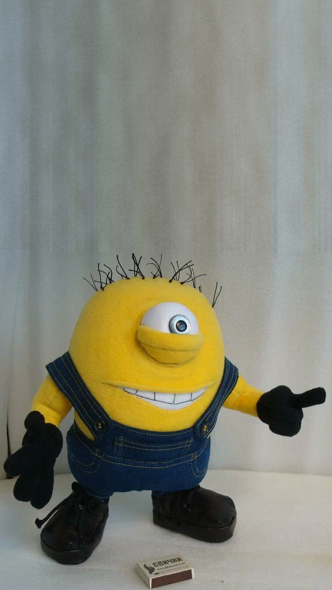 One-eyed Minion plush with the goggle off, stitched eyelid and denim overalls, a custom toy made to order